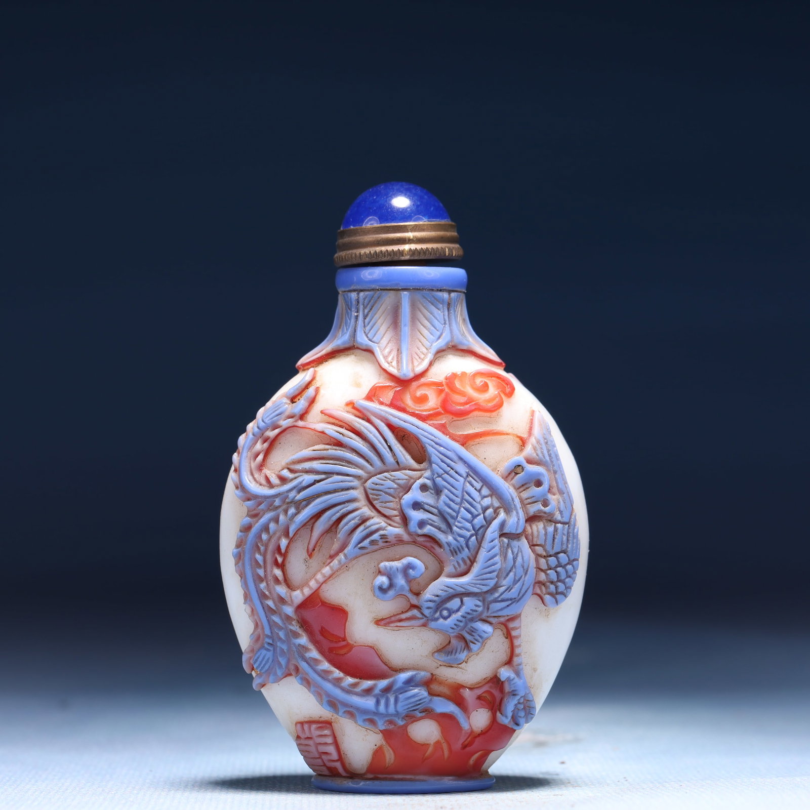 An Exquisite Glass Auspicious Beast Pattern Snuff Bottle: An Exquisite Glass Auspicious Beast Pattern Snuff Bottle,Qing Dynasty,China,Size:2inx1inx3.1in,Weight:75g