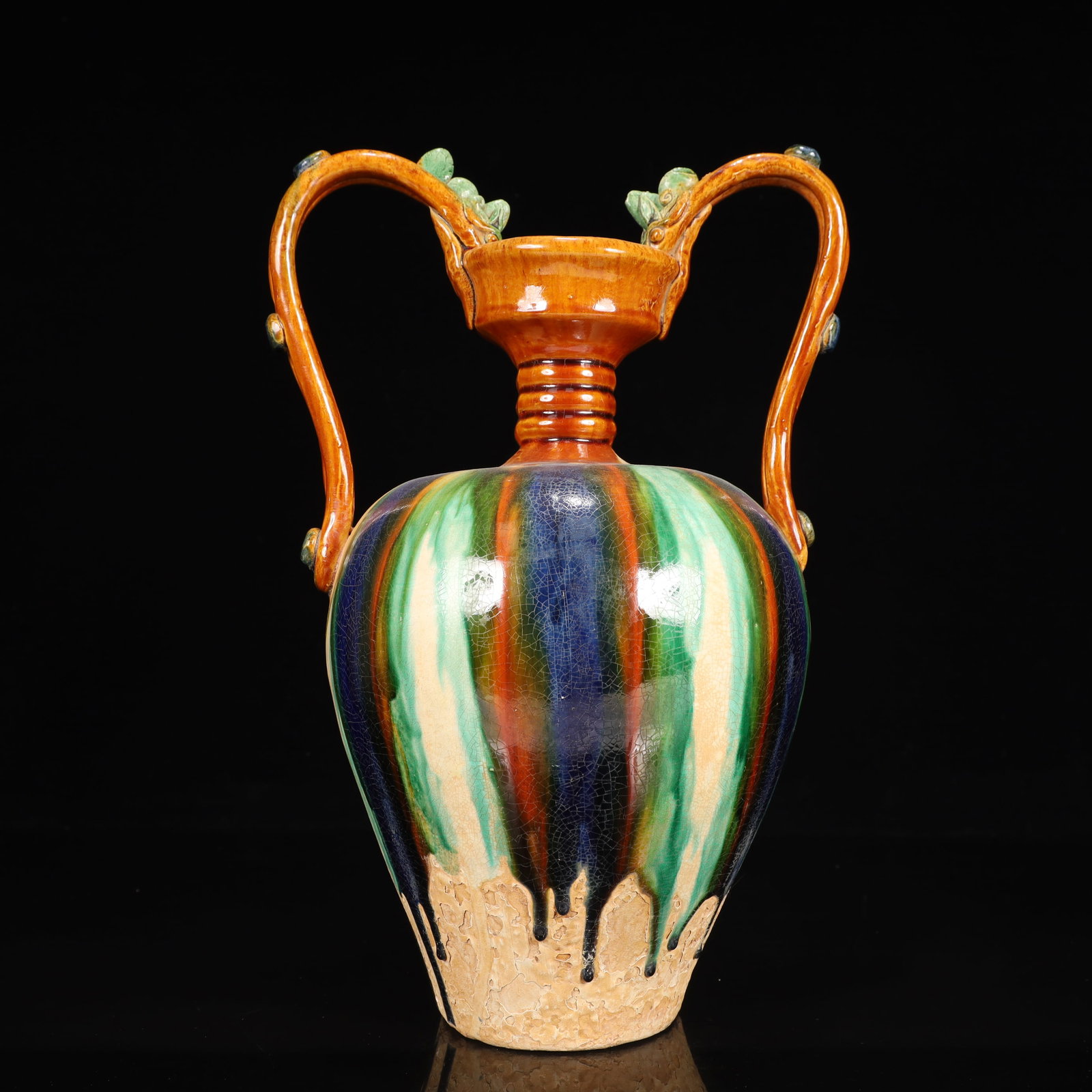 A Rare Tang Tri-Color Glazed Pottery Double Dragon Ears Vase: A Rare Tang Tri-Color Glazed Pottery Double Dragon Ears Vase,Tang Dynasty, China,Chinese Tang Tri-colored Pottery, or Tang Sancai, flourished during the Tang Dynasty (618–907 AD). It's renowned 