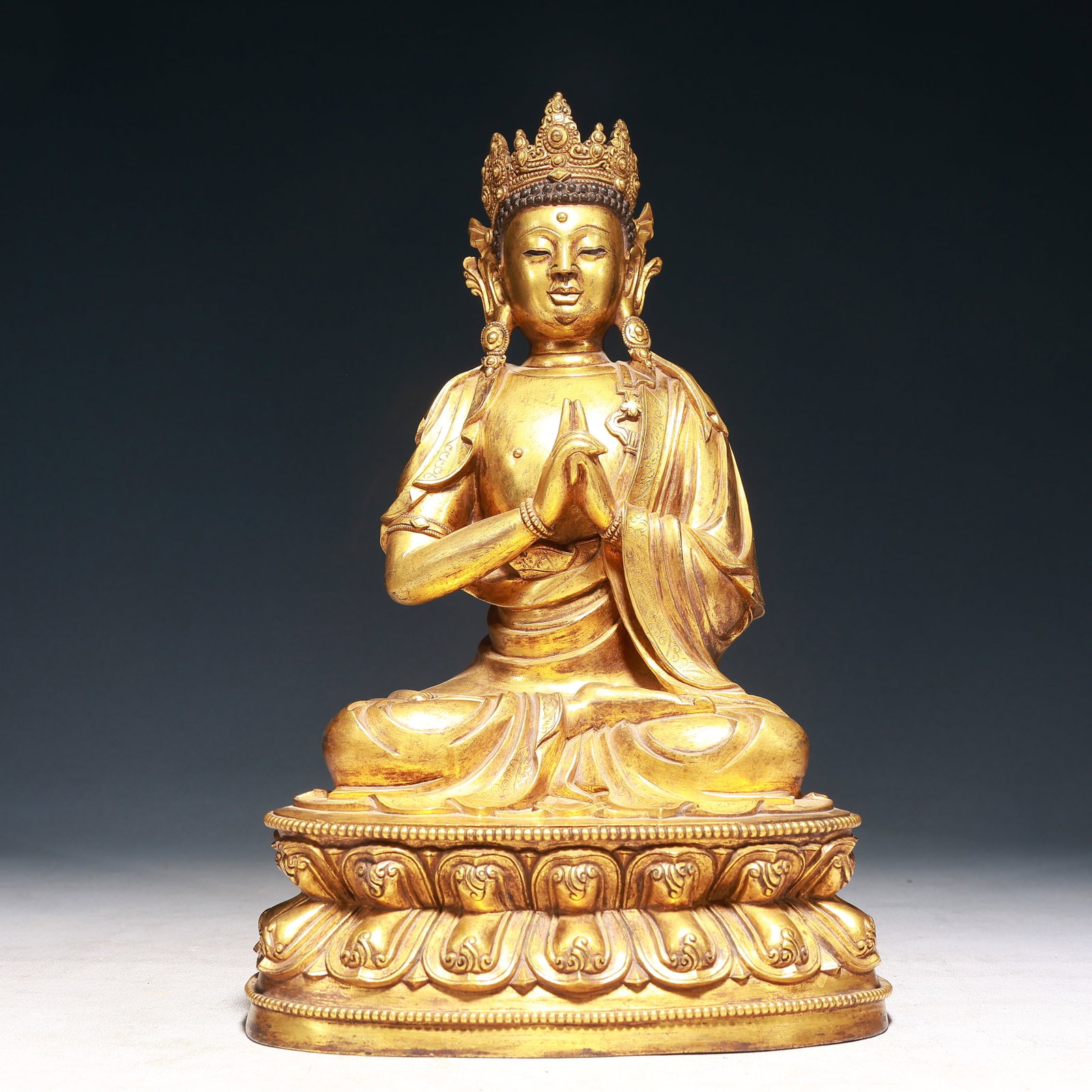 A Solemn Gilt Bronze Statue of Mah??vairocana: A Solemn Gilt Bronze Statue of Mahāvairocana,Qing Dynasty,China,Size:7.9inx5.9inx13in,Weight:7950g