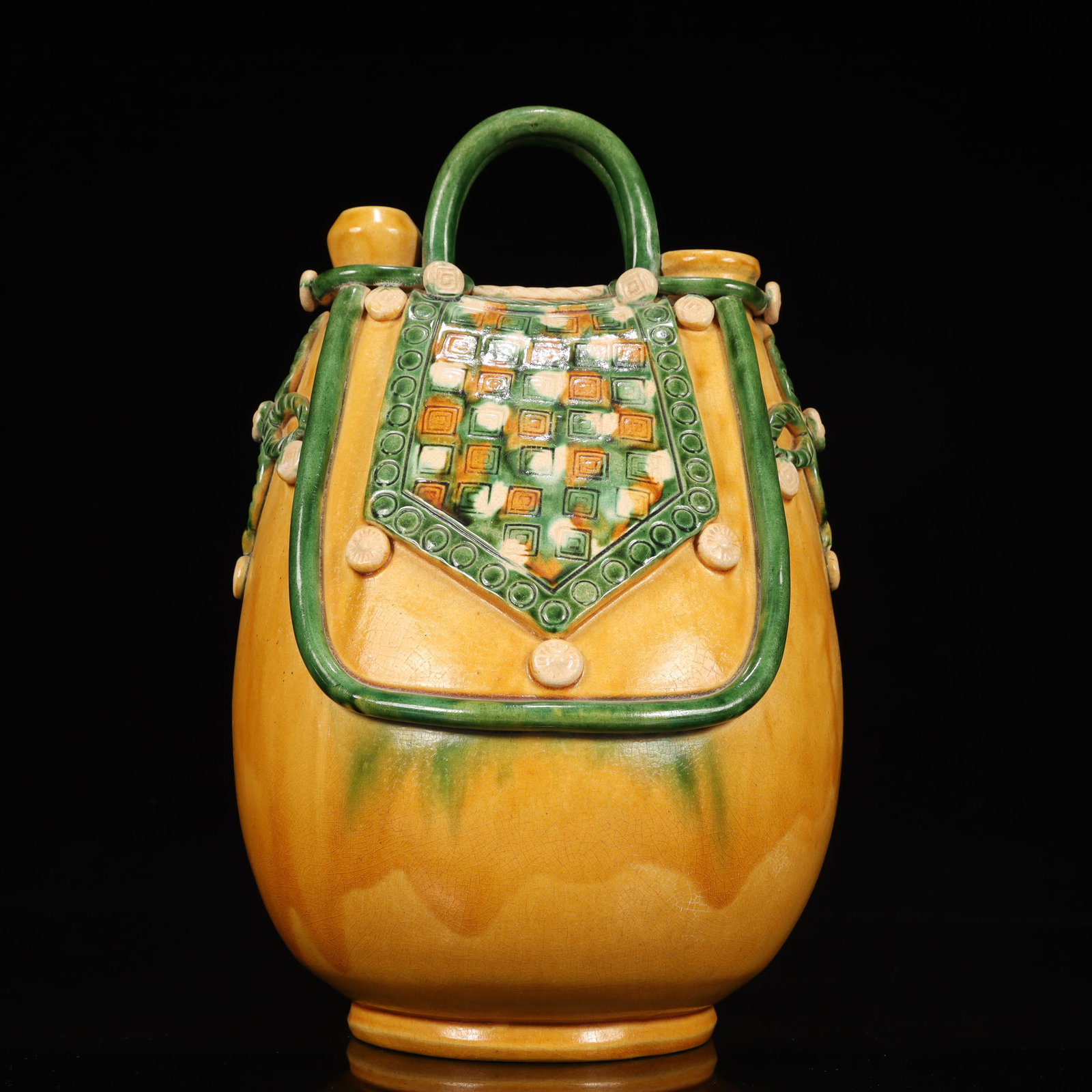 A Rare Tang Tri-Color Glazed Pottery Ewer: A Rare Tang Tri-Color Glazed Pottery Ewer,Tang Dynasty, China,Chinese Tang Tri-colored Pottery, or Tang Sancai, flourished during the Tang Dynasty (618–907 AD). It's renowned for its vibrant amb