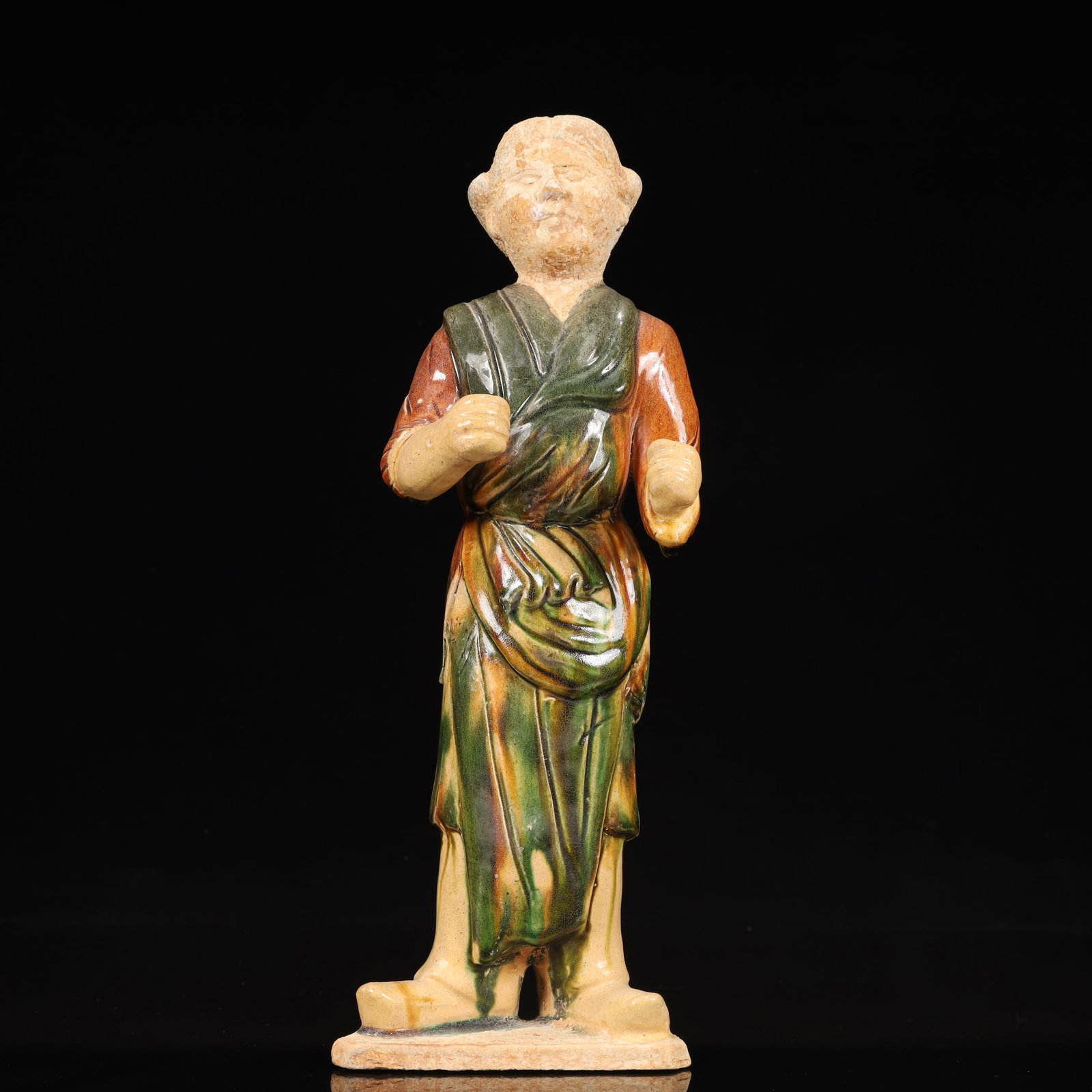 A Rare Tang Tri-Color Glazed Pottery Woman Ornament: A Rare Tang Tri-Color Glazed Pottery Woman Ornament,Tang Dynasty, China,Chinese Tang Tri-colored Pottery, or Tang Sancai, flourished during the Tang Dynasty (618–907 AD). It's renowned for its