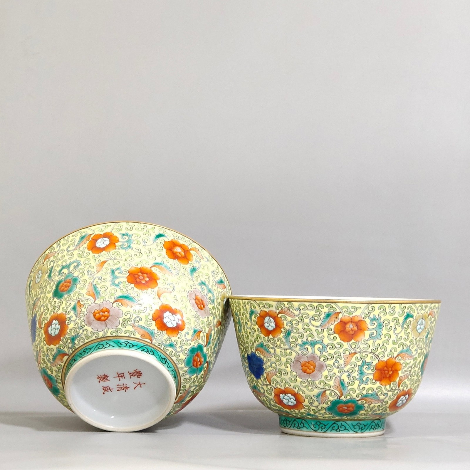 A Pair of Exquisite Famille-Rose Yellow Ground Painted Gold Flower Pattern Bowls: A Pair of Exquisite Famille-Rose Yellow Ground Painted Gold Flower Pattern Bowls,Qing Dynasty,China,Xianfeng Six-character Mark,Size:3.1inx5.1in