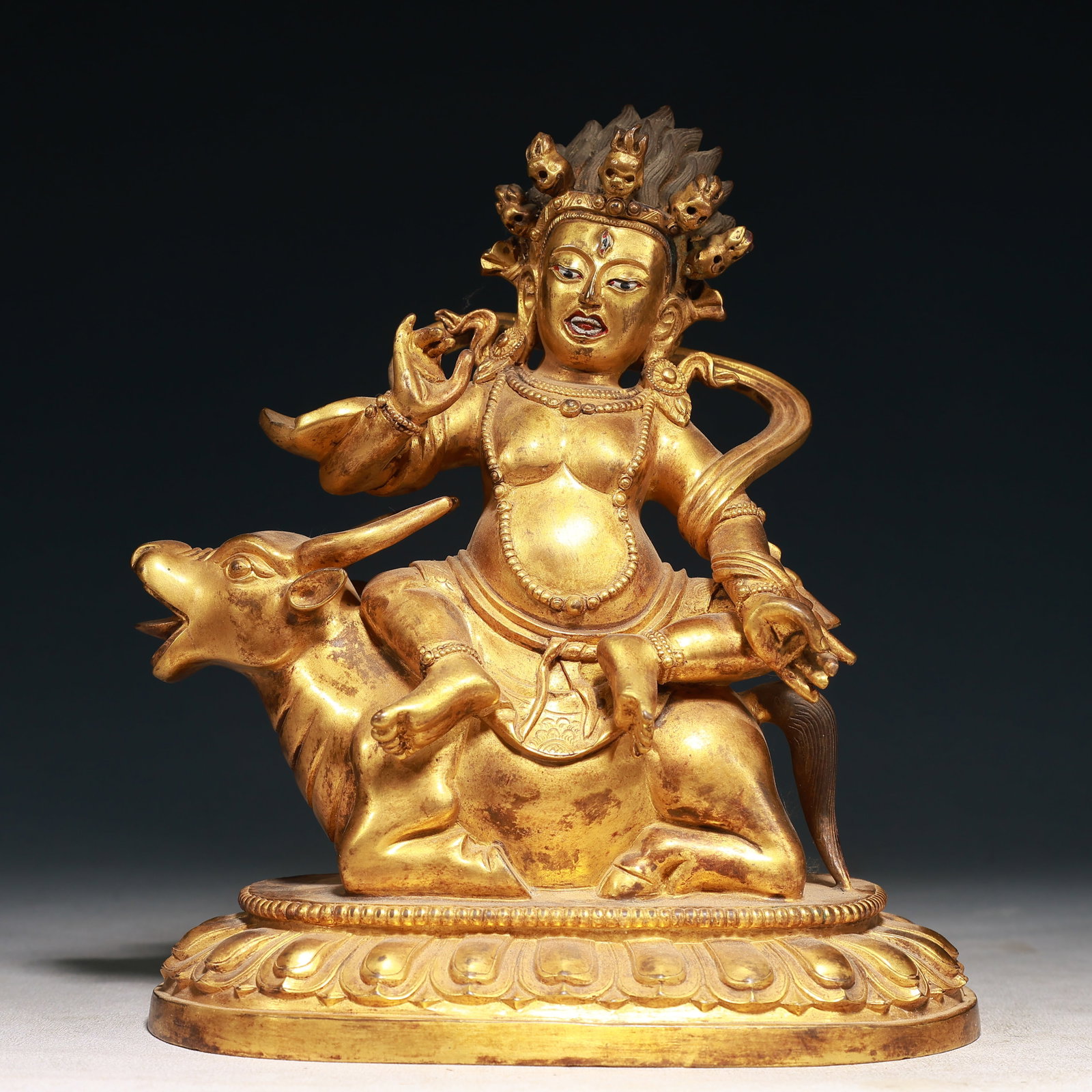A Solemn Gilt Bronze Rides the Buffalo Buddha Statue: A Solemn Gilt Bronze Rides the Buffalo Buddha Statue,Ming Dynasty,China,Yongle Six-character Mark,Size:7.5inx4.7inx9.1in,Weight:3600g