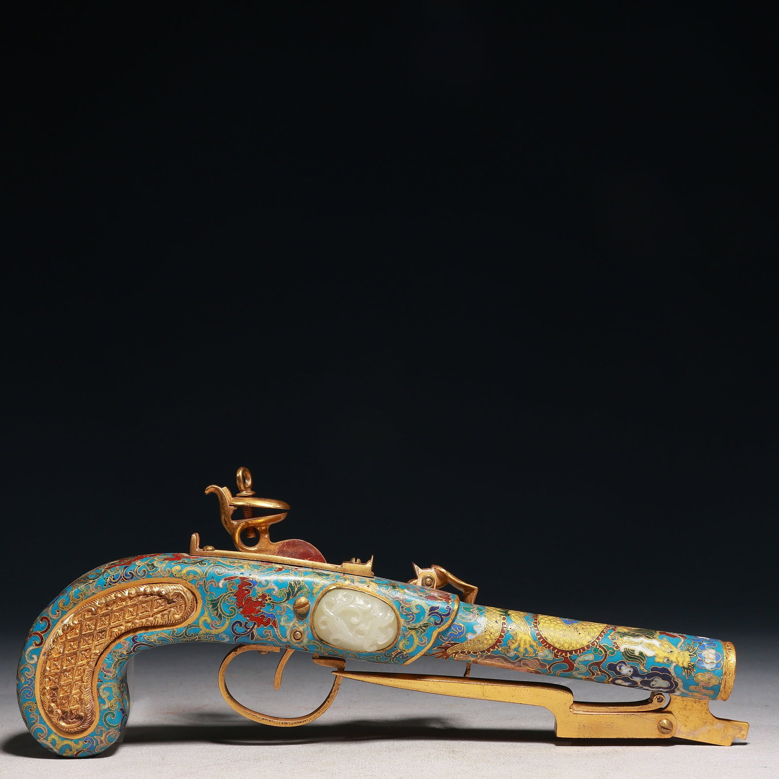 A Huge Cloisonne Inlaid White Jade Auspicious Cloud and Dragon Pattern? Ornament: A Huge Cloisonne Inlaid White Jade Auspicious Cloud and Dragon Pattern枪 Ornament,Qing Dynasty,China,Qianlong Four-character Mark,Size:15.7inx1.2inx3.9in,Weight:650g 景泰蓝&