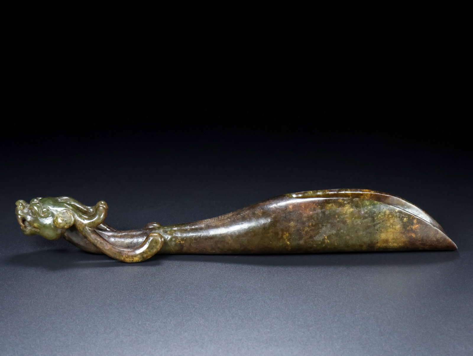 An Exquisite Archaic Jade Dragon Ornament: An Exquisite Archaic Jade Dragon Ornament,Ancient Time,China,Size:11.8inx2inx1.6in,Weight:477g 高古玉龙摆件,中国远古时期