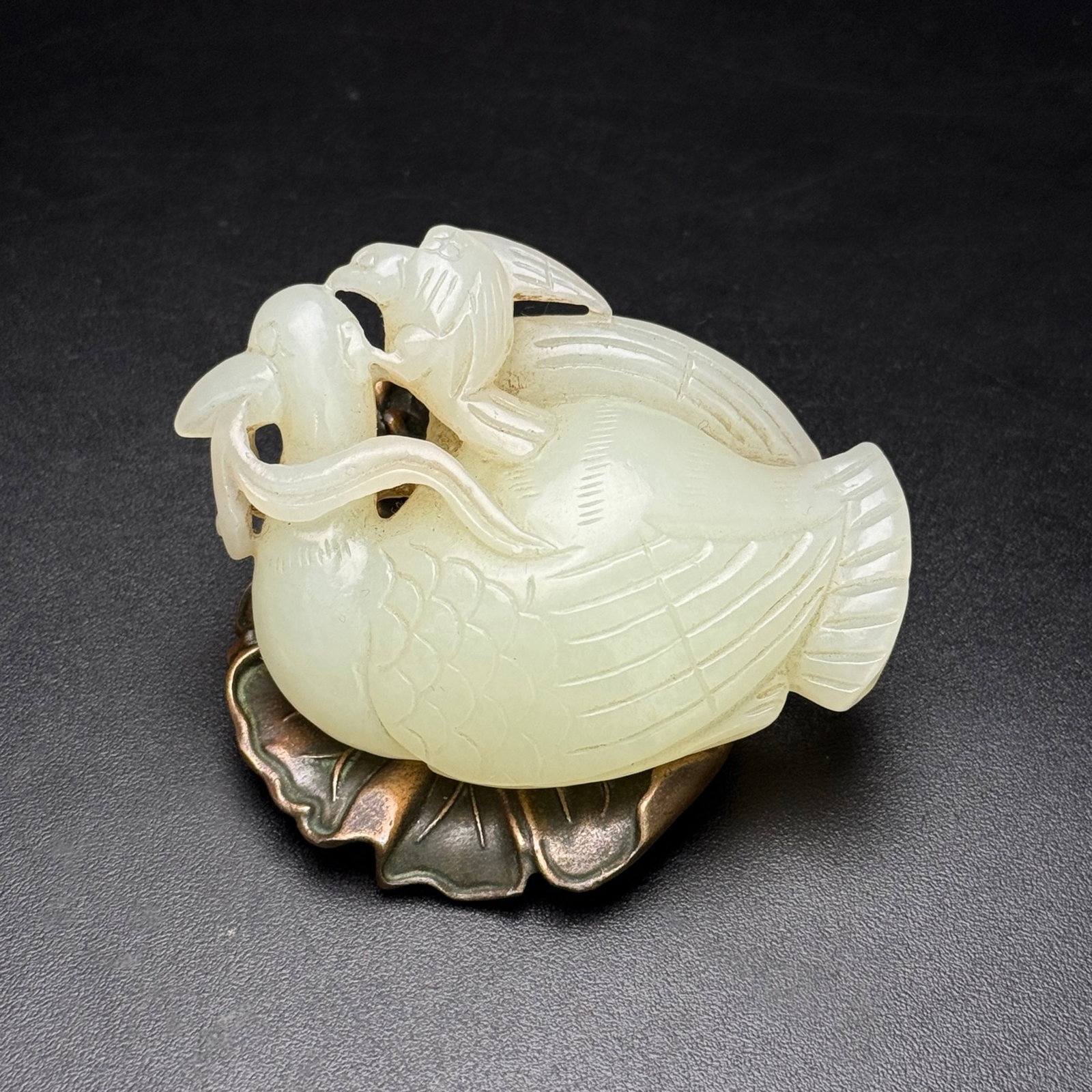 An Exquisite White Jade Bird Pattern Goose Hand Piece: An Exquisite White Jade Bird Pattern Goose Hand Piece,Qing Dynasty,China,Size:2.7inx2inx0.7in,Weight:70g 白玉鸟纹鹅手把件,中国清ߣ