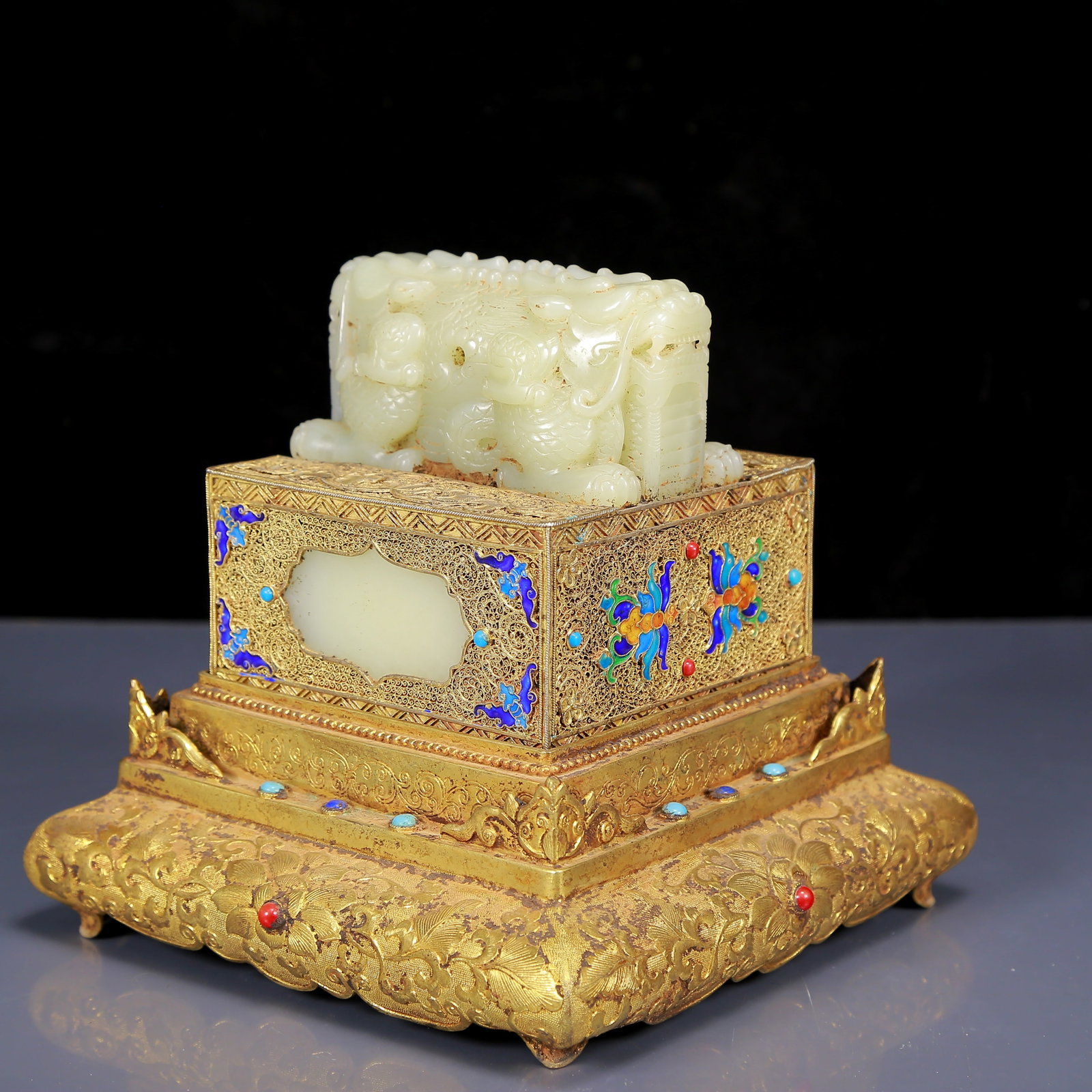 An Exquisite White Jade Gilt Bronze Inlaid Turquoise Dragon Pattern Seal: An Exquisite White Jade Gilt Bronze Inlaid Turquoise Dragon Pattern Seal,Qing Dynasty, China, Qianlong Four-character Mark,Size:7.1inx6.7in,Weight:3465g 白玉铜鎏金嵌
