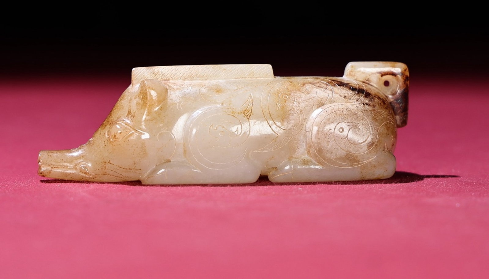 An Exquisite White Jade Pig Ornament: An Exquisite White Jade Pig Ornament,Qing Dynasty,China,Size:3.5inx1.1inx1in,Weight:99g 白玉猪摆件,中国清代