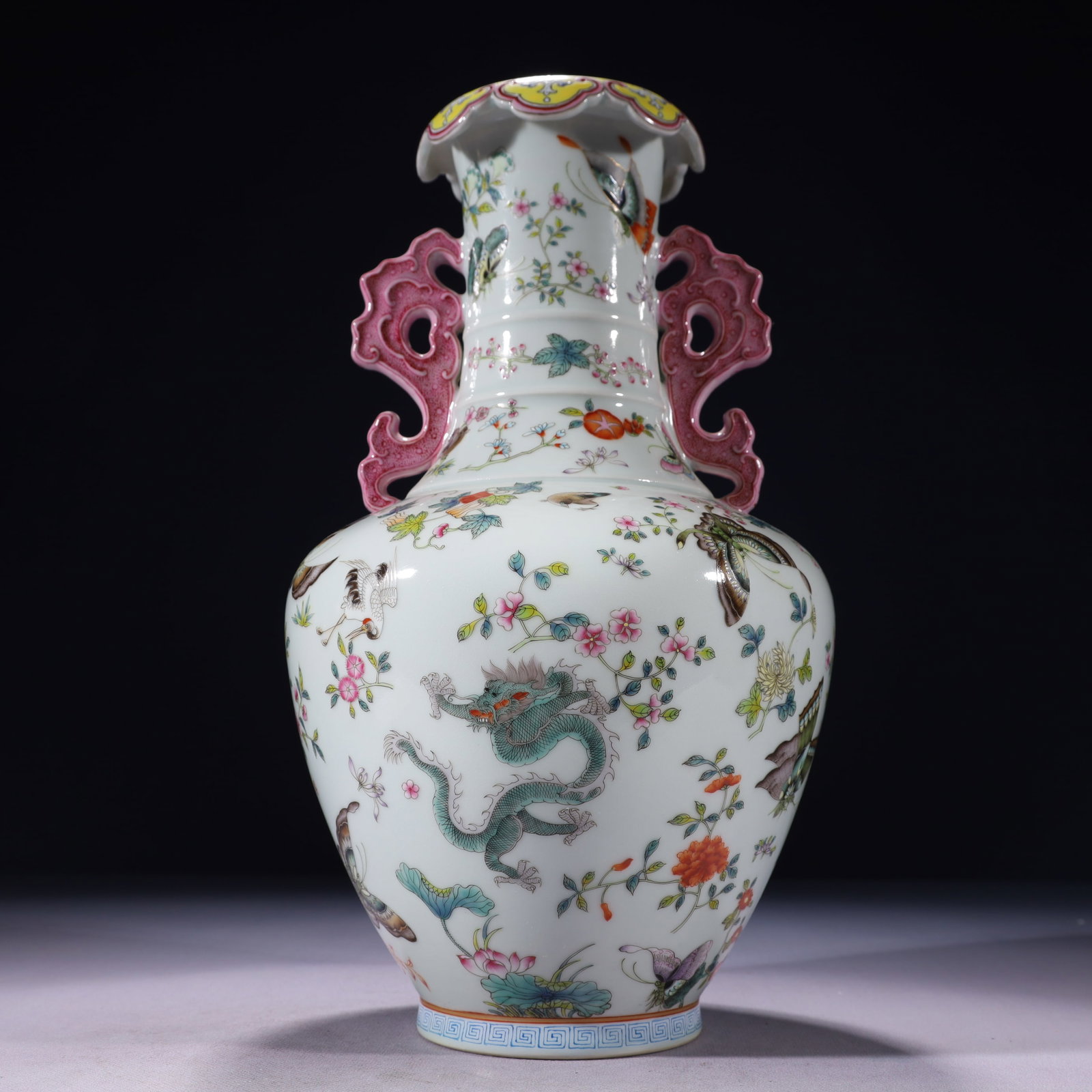 An Exquisite Famille-Rose Painted Gold Flower and Butterfly Pattern Double-Ears Vase: An Exquisite Famille-Rose Painted Gold Flower and Butterfly Pattern Double-Ears Vase,Qing Dynasty,China,Qianlong Six-character Mark,Size:7.1inx13.8in,Weight:2200g