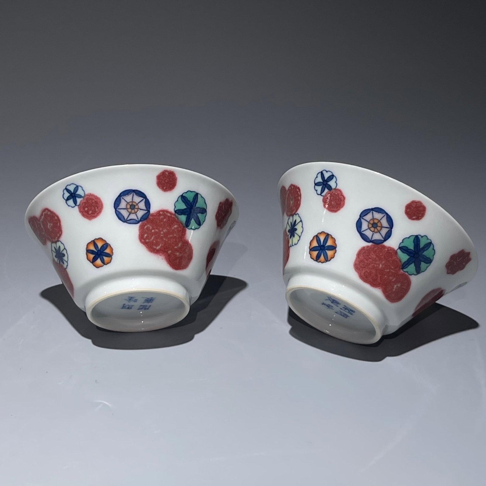 A Pair of Exquisite Blue and White Underglaze-Red Flower Pattern Cups: A Pair of Exquisite Blue and White Underglaze-Red Flower Pattern Cups,Qing Dynasty,China,With Mark,Size:1.7inx3.3in