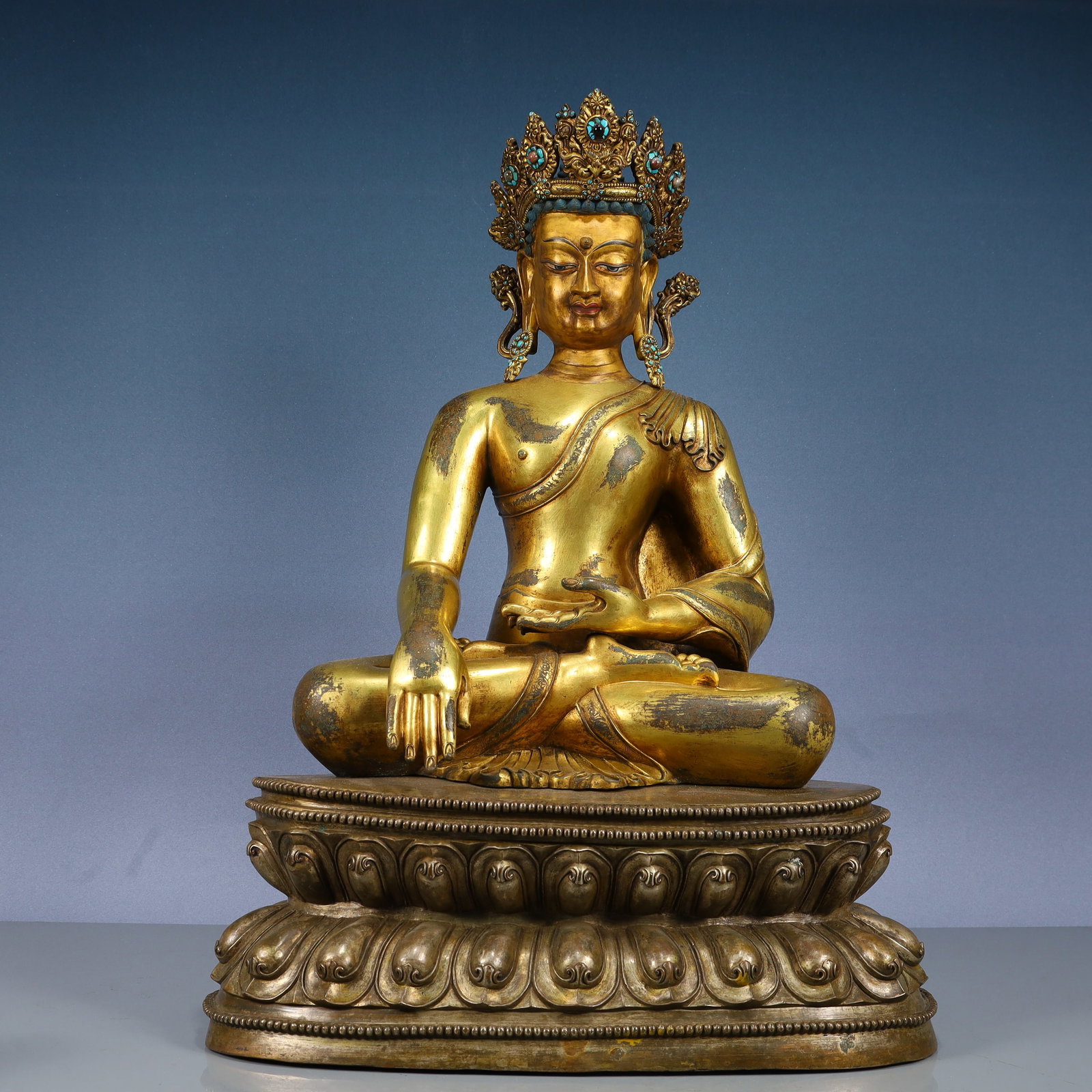 A Solemn Gilt Bronze Statue of Sakyamuni,Inlaid Turquoise,With Inscription: A Solemn Gilt Bronze Statue of Sakyamuni,Inlaid Turquoise,With Inscription,Qing Dynasty, China,Size:16.1inx10.6inx23.6in,Weight:21150g