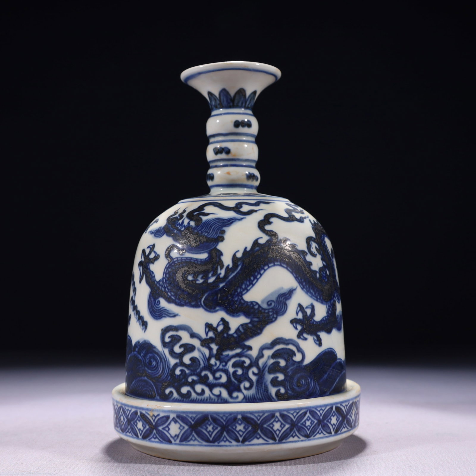 An Exquisite Blue and White Seawater and Dragon Pattern Vase: An Exquisite Blue and White Seawater and Dragon Pattern Vase,Ming Dynasty,China,Xuande Six-character Mark,Size:5.1inx7.9in,Weight:900g