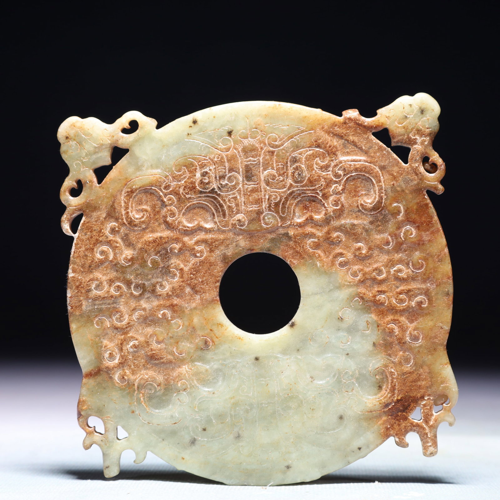 An Exquisite White Jade Beast-Face Pattern Ornament: An Exquisite White Jade Beast-Face Pattern Ornament,Qing Dynasty,China,Size:4.3inx4.3in,Weight:155.9g 白玉兽面纹摆件,中国清代
