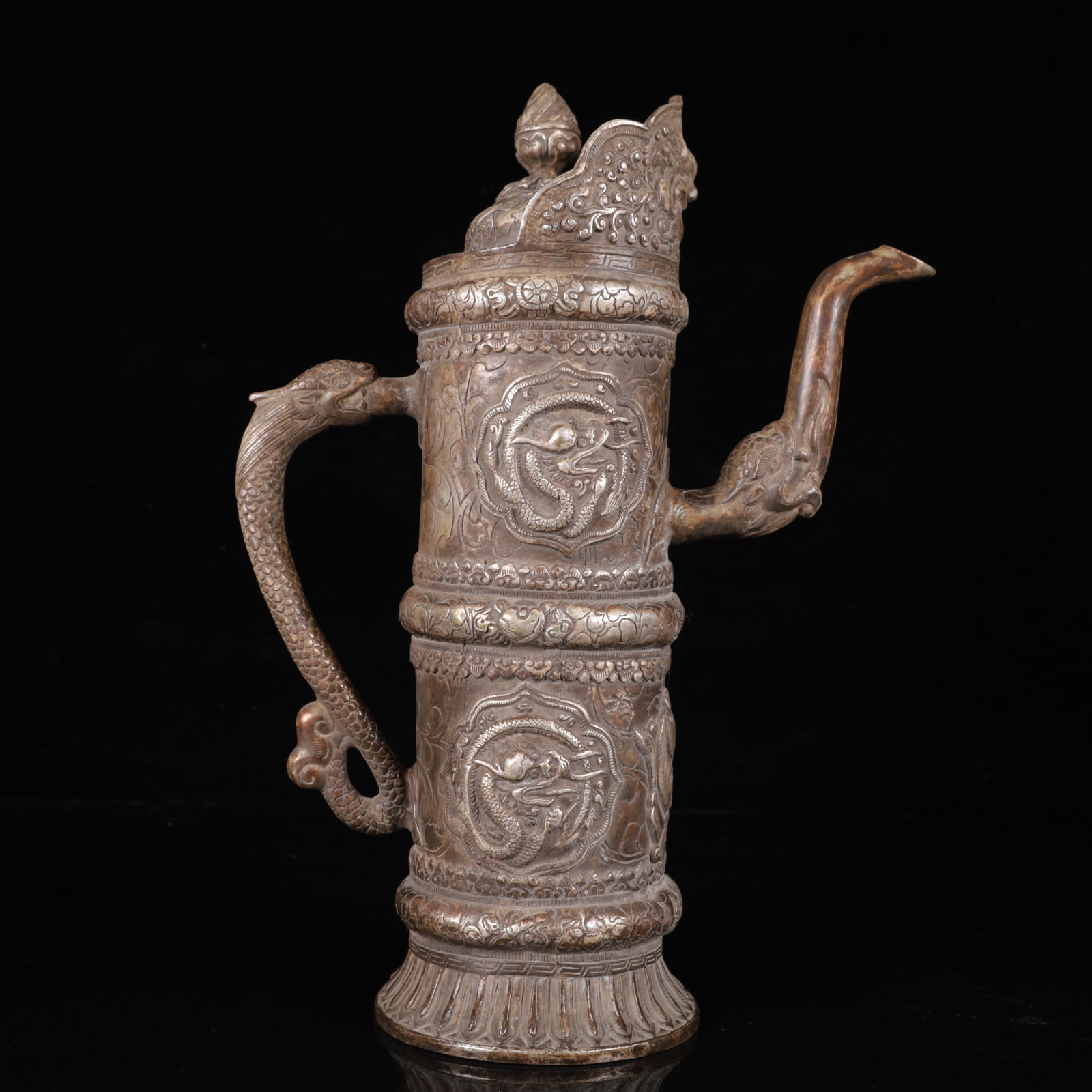 An Exquisite Silver-Plated Bronze Dragon Pattern Ewer: An Exquisite Silver-Plated Bronze Dragon Pattern Ewer,Qing Dynasty,China,Size:9.4inx4.5inx13in,Weight:2350g 铜镀银龙纹执壶,中国清代