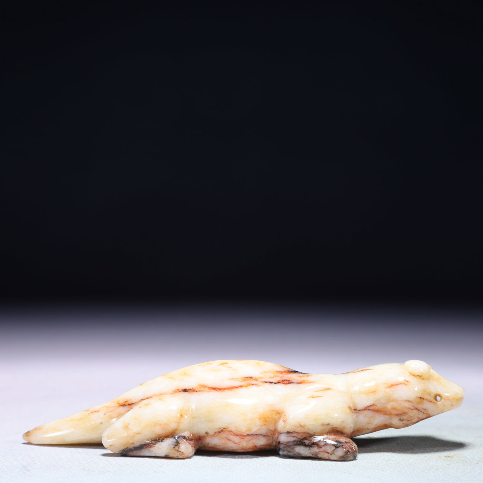 An Exquisite White Jade Animal Ornament: An Exquisite White Jade Animal Ornament,Qing Dynasty,China,Size:5.5inx1.8inx1in,Weight:223.1g 白玉动物摆件,中国清代