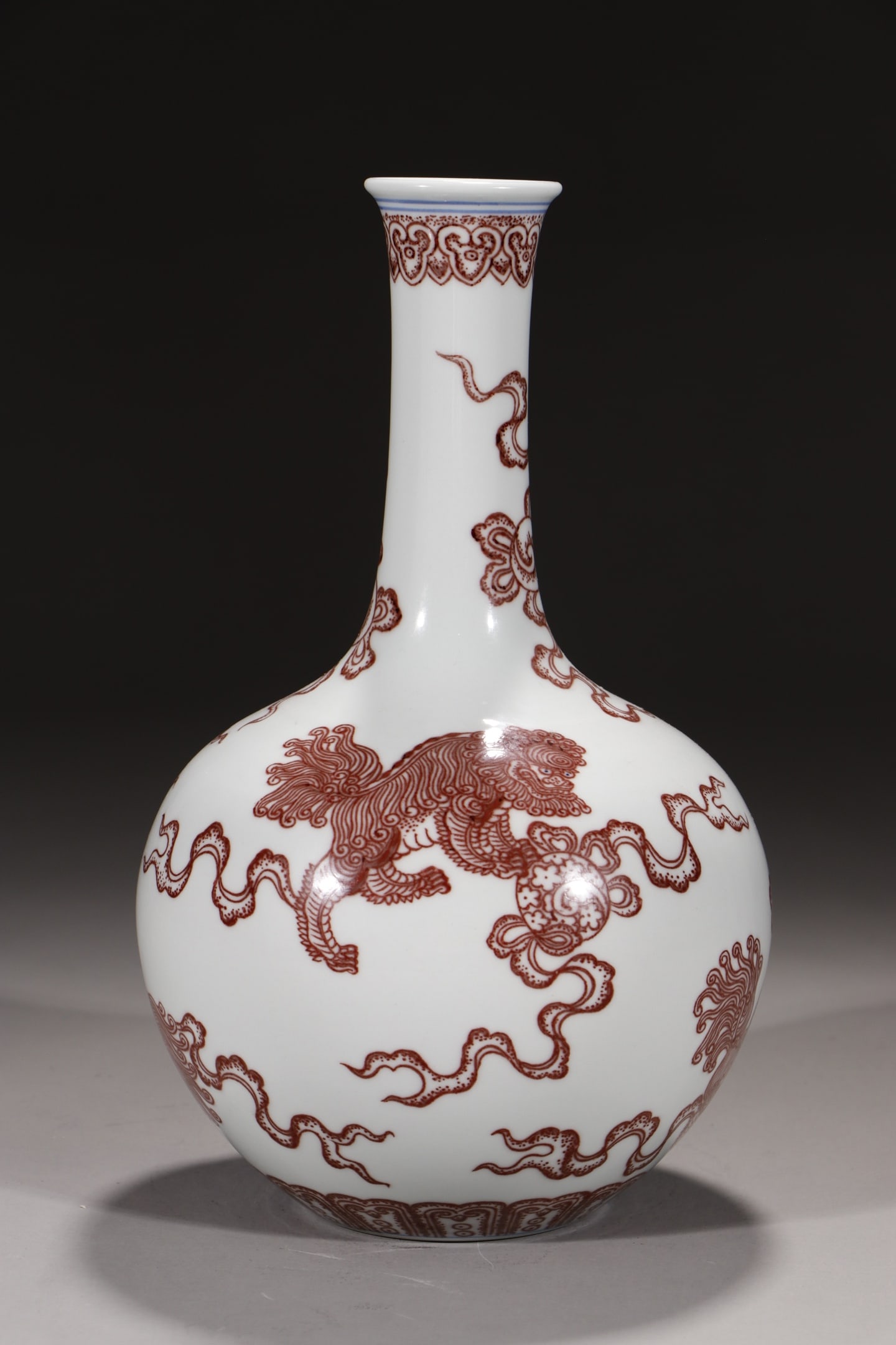 An Exquisite Underglaze-Red Lion Pattern Vase: An Exquisite Underglaze-Red Lion Pattern Vase,Qing Dynasty,China,Qianlong Six-character Mark,Size:9.6in 釉里红狮子纹瓶,中国清代,ߙ