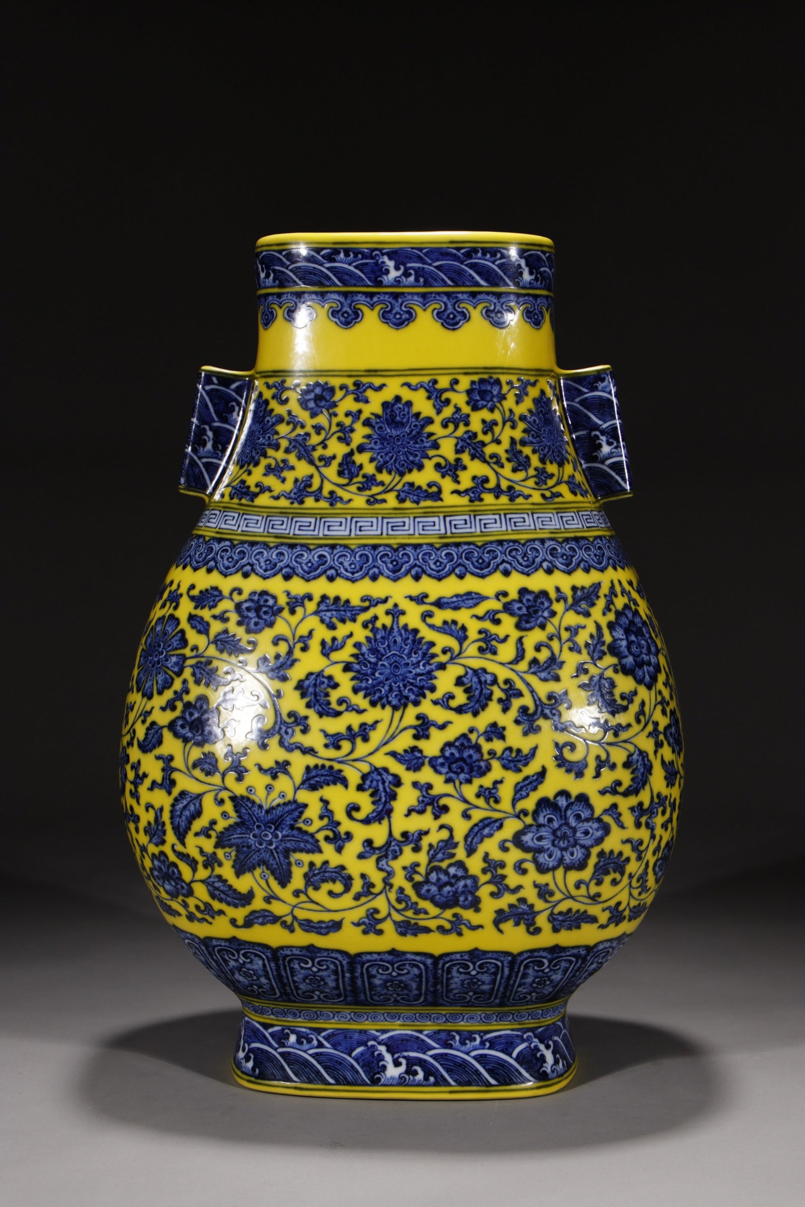 A Huge Yellow Ground Blue and White Lotus Pattern Double-Ears Vase: A Huge Yellow Ground Blue and White Lotus Pattern Double-Ears Vase,Qing Dynasty,China,Qianlong Six-character Mark,Size:17.1in