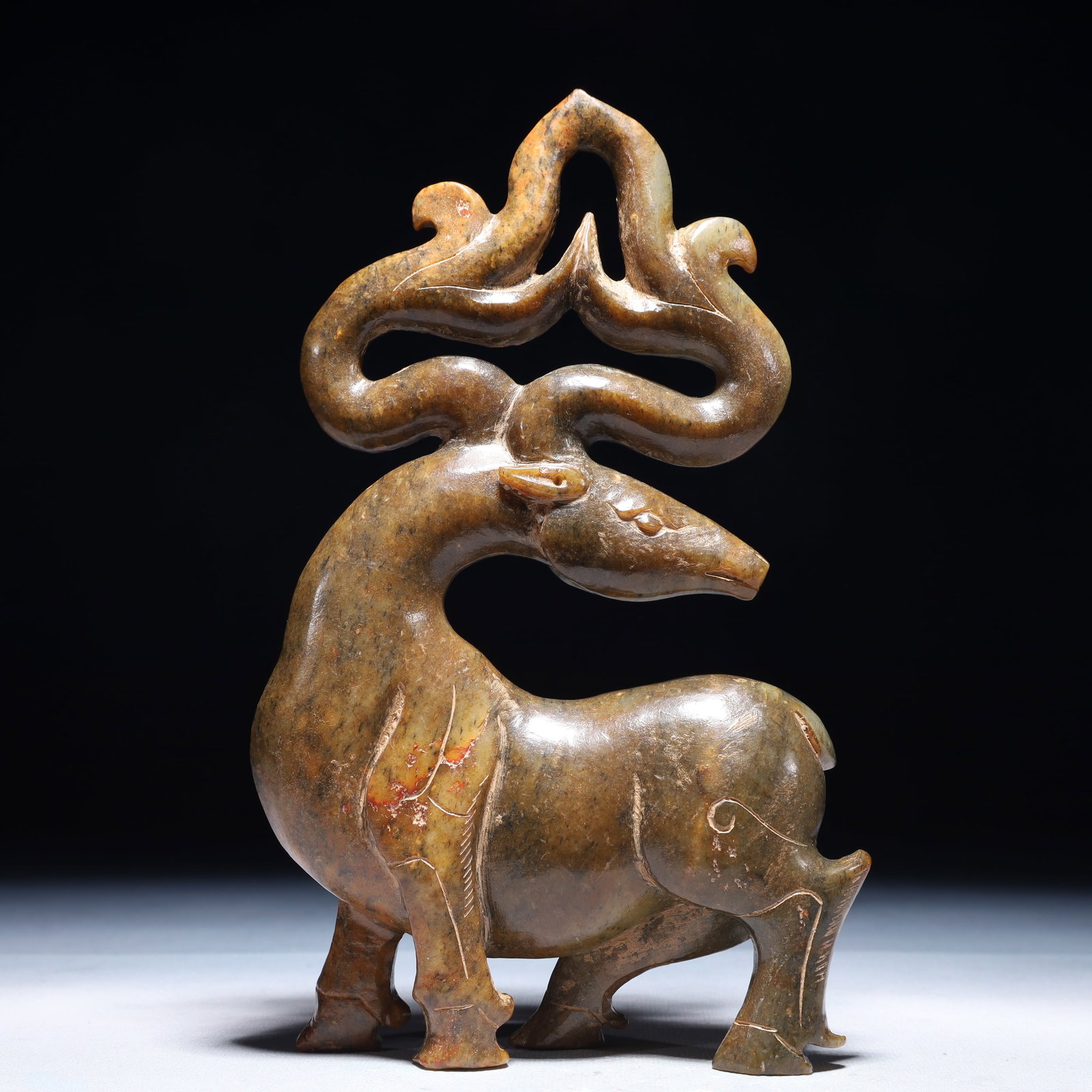 An Archaic Archaic Jade Deer Ornament: An Archaic Archaic Jade Deer Ornament,Ancient Time,China,Size:5.1inx1.4inx8.3in,Weight:800g 高古玉鹿摆件,中国远古时期