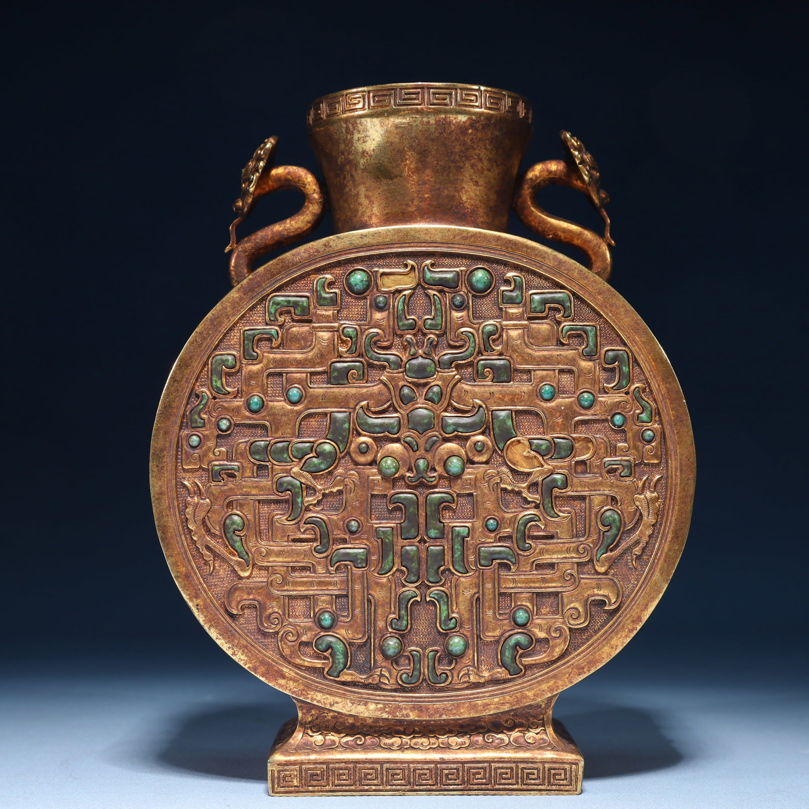 An Exquisite Gilt Bronze Beast-Face Pattern Double-Ears Vase,Inlaid Turquoise: An Exquisite Gilt Bronze Beast-Face Pattern Double-Ears Vase,Inlaid Turquoise,Qing Dynasty,China,Size:5.5inx2.4inx7.1in,Weight:1250g 铜鎏金兽面纹双耳