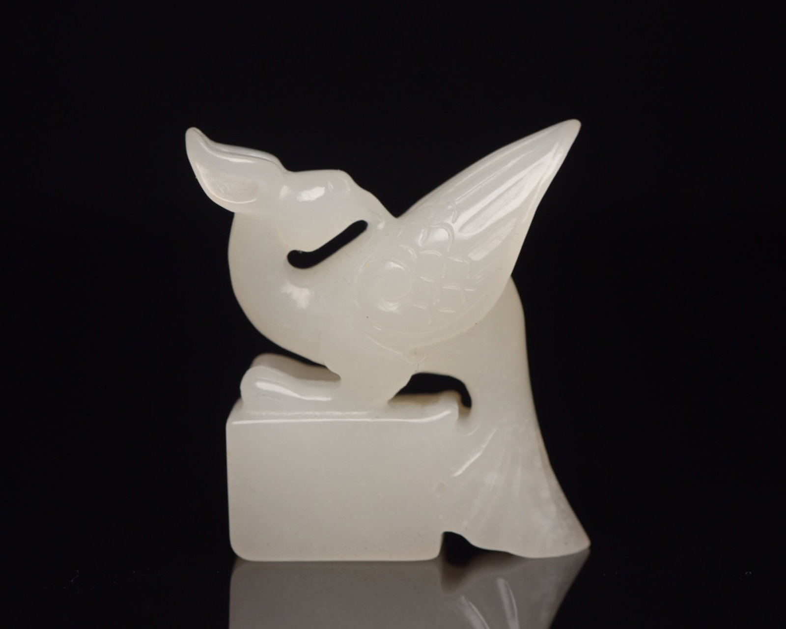 An Exquisite White Jade Phoenix Seal: An Exquisite White Jade Phoenix Seal,Qing Dynasty,China,Size:1.7inx1.6inx0.6in,Weight:38g 白玉凤印章,中国清代