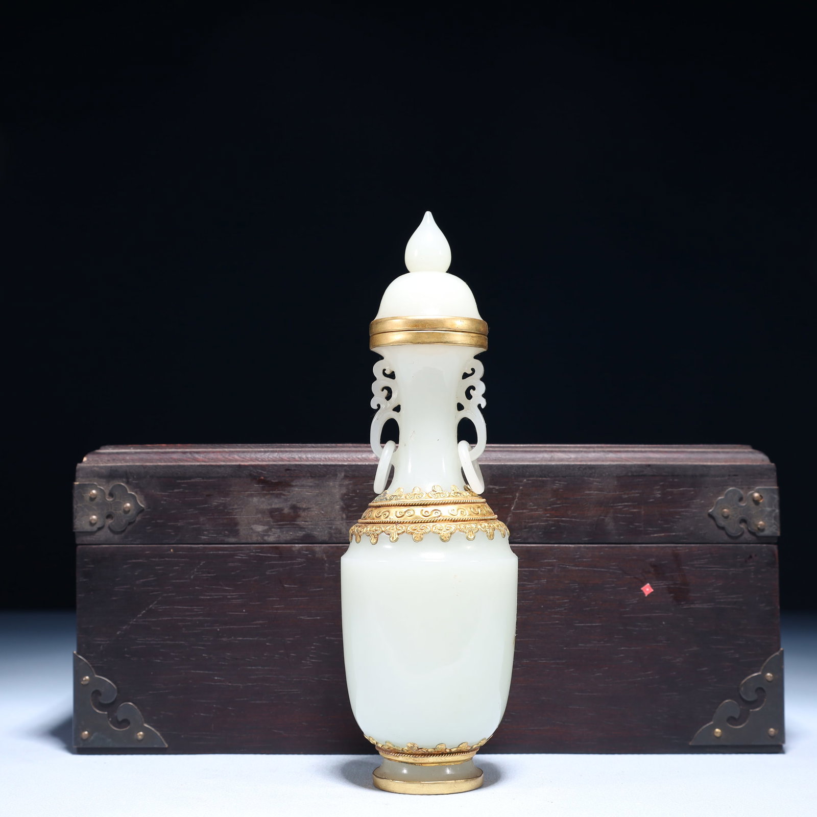 An Exquisite White Jade Gilt Double-Ears Bottle: An Exquisite White Jade Gilt Double-Ears Bottle,Qing Dynasty,China,Size:2.4inx7.5in,(Box)9.8inx4.7inx4.3in,Weight:250g