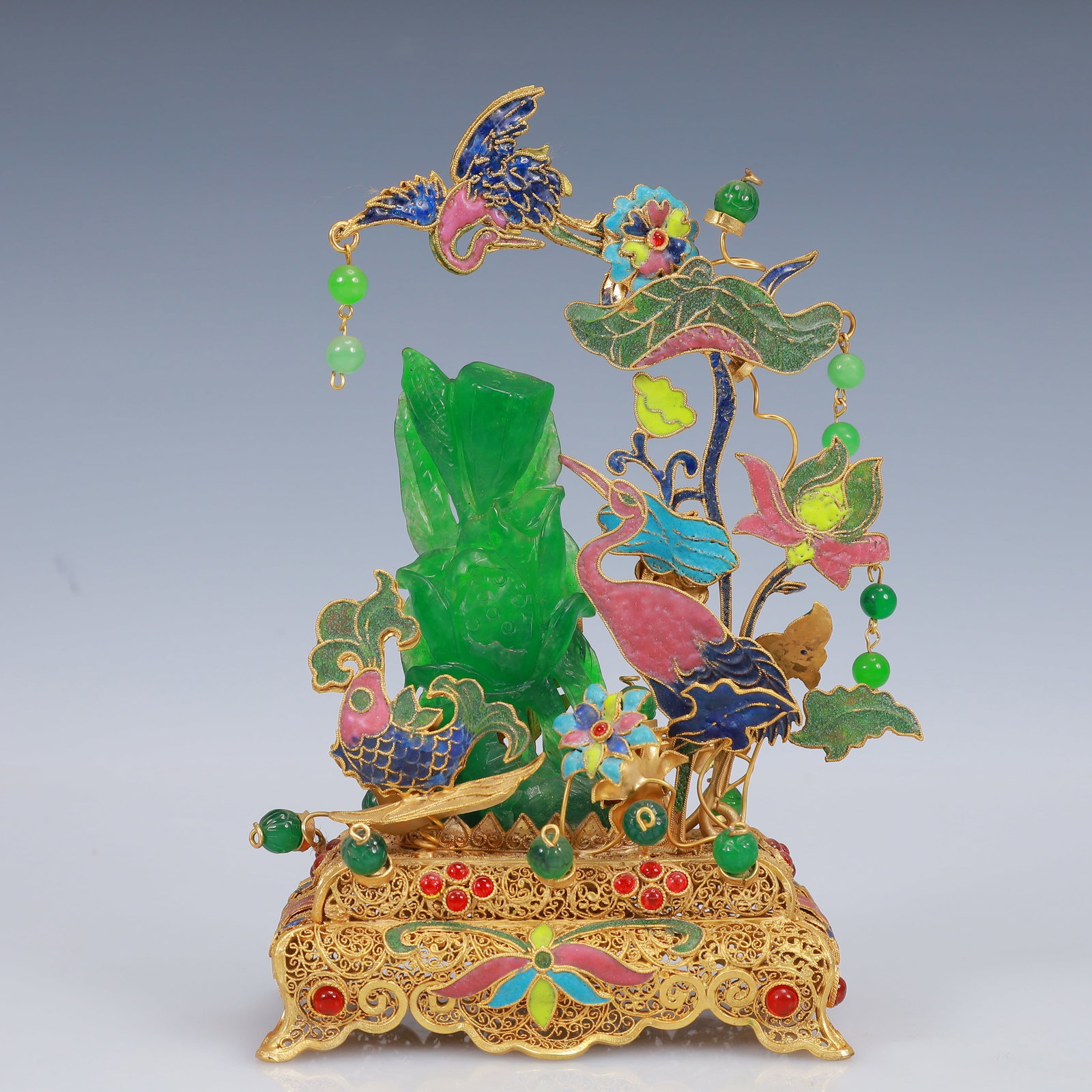 An Exquisite Filigree and Gilding Inlaid Jadeite Lotus Ornament,Inlaid Gems: An Exquisite Filigree and Gilding Inlaid Jadeite Lotus Ornament,Inlaid Gems,Qing Dynasty, China,Qianlong Four-Character Mark,Size:4.7inx2.8inx7.9in,Weight:358g 花丝鎏金嵌