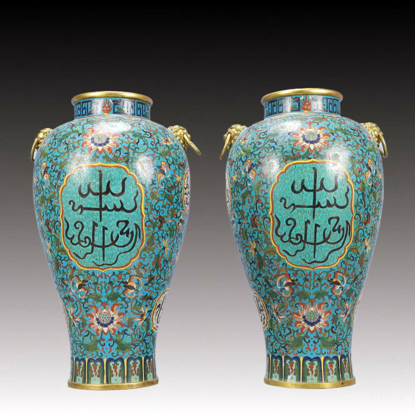 A Pair of Huge Cloisonne Lotus and Bats Pattern Lion-Ears Vases,With Sanskrit: A Pair of Huge Cloisonne Lotus and Bats Pattern Lion-Ears Vases,With Sanskrit,Qing Dynasty,China,Qianlong Four-character Mark,Size:9.4inx15.7in,Total Weight:8700g 一对景泰Ŕ