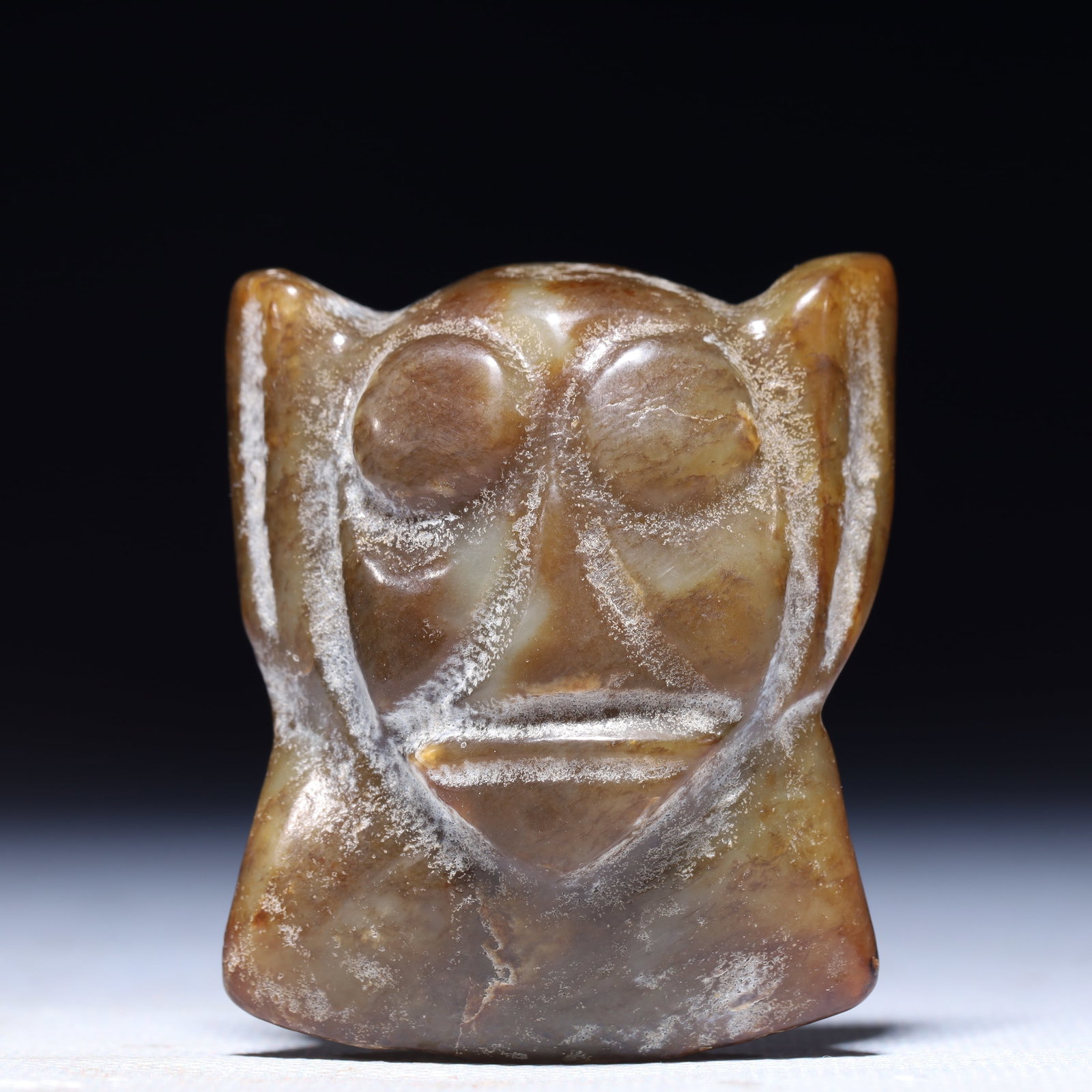 An Archaic Hongshan Culture Greenish Jade Figure-Face Pattern Ornament: An Archaic Hongshan Culture Greenish Jade Figure-Face Pattern Ornament,Ancient Time,China,Size:1.8inx0.6inx2.2in,Weight:73g 红山文化青白玉人面 