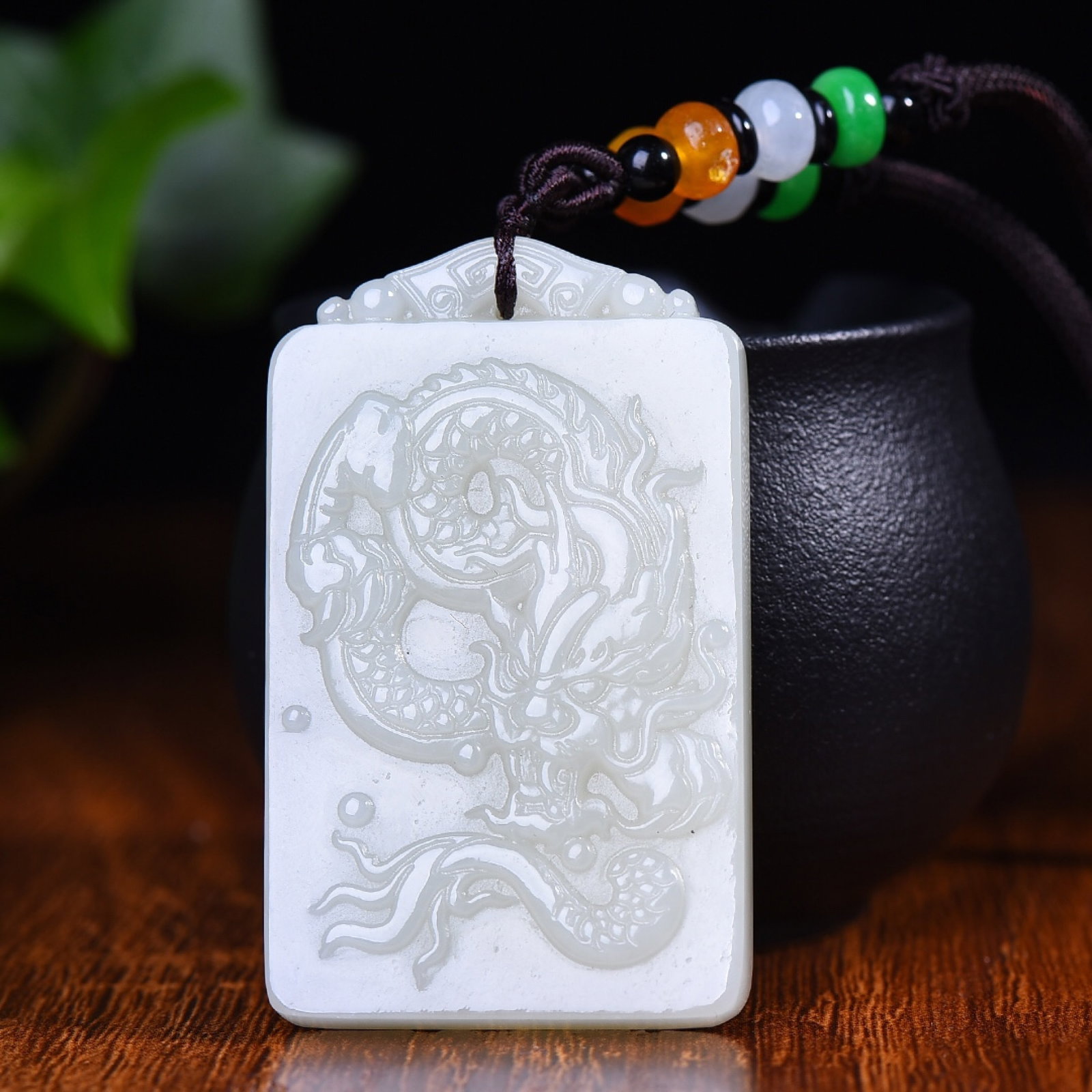 An Exquisite White Jade Dragon Pattern Pendant: An Exquisite White Jade Dragon Pattern Pendant,Size:1.4inx2.4in (寓意)能兴云布雨,利益万物,顺风得利