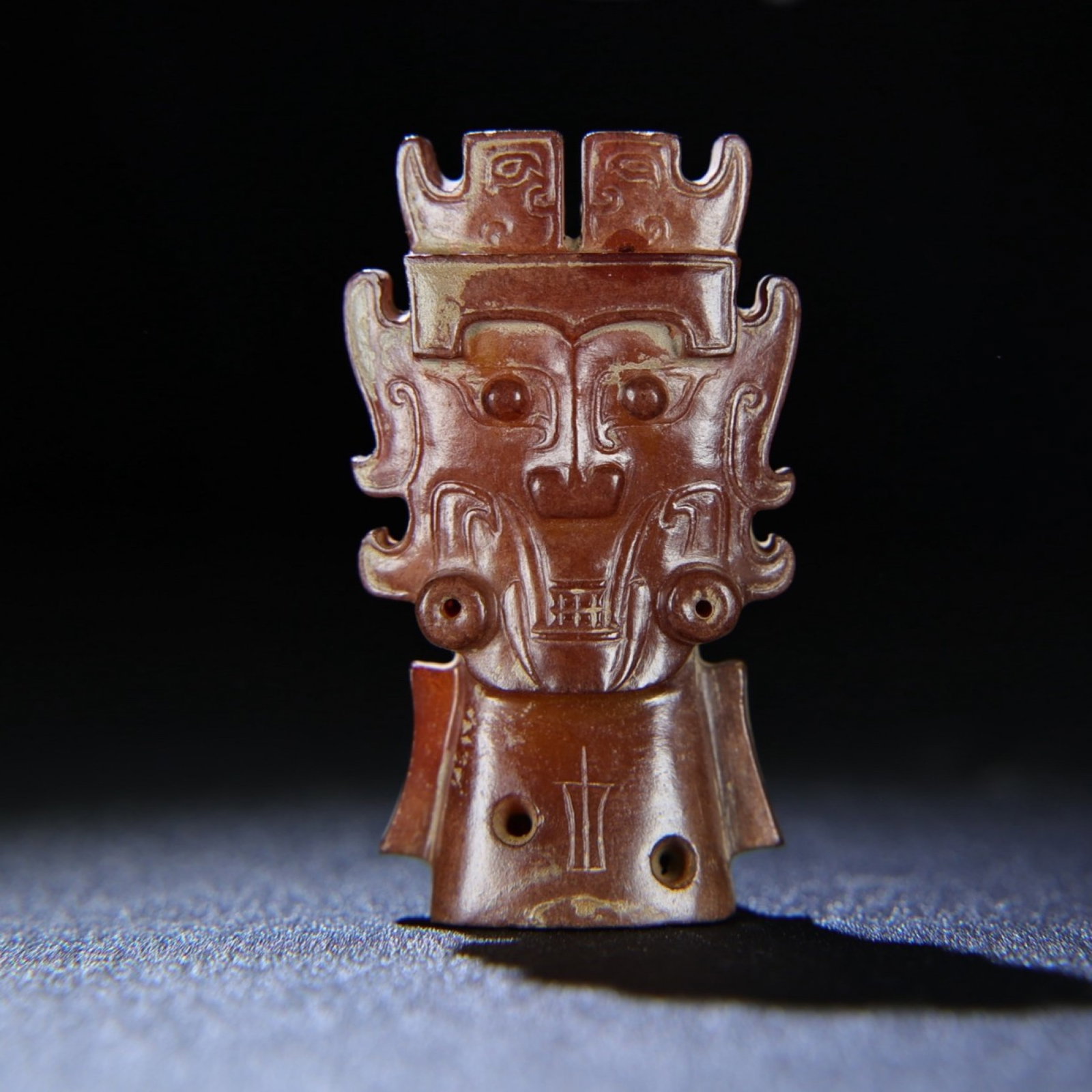 An Exquisite Archaic Jade Figure-Face Pattern Ornament: An Exquisite Archaic Jade Figure-Face Pattern Ornament,Ancient Time,China,Size:2.8inx1.6inx0.9in,Weight:95g 高古玉人面纹摆件,中国远