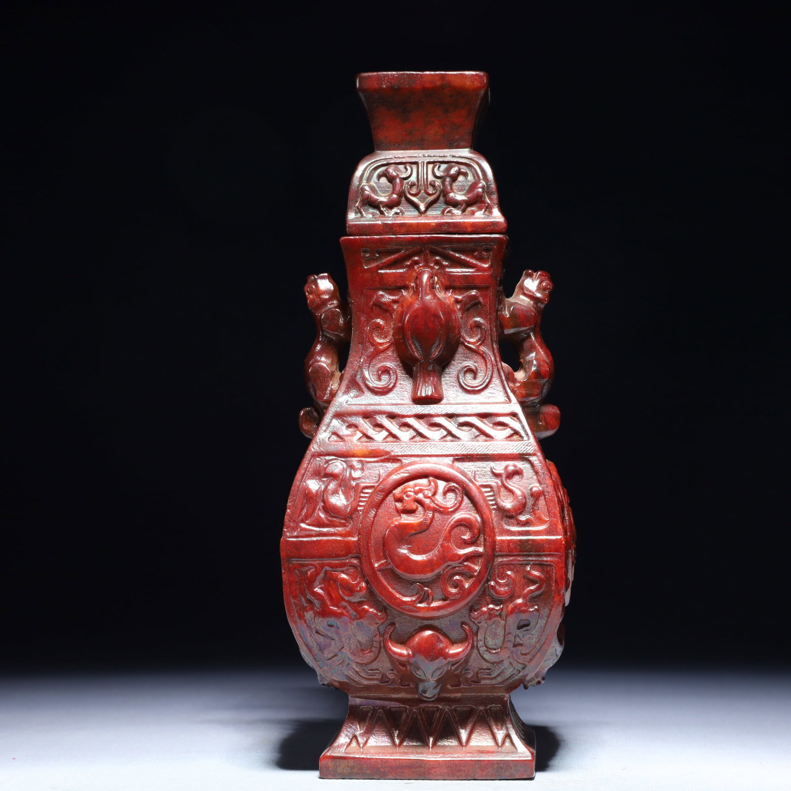 An Exquisite Archaic Jade Auspicious Beast Pattern Beast-Ears Bottle: An Exquisite Archaic Jade Auspicious Beast Pattern Beast-Ears Bottle,Ancient Time,China,Size:3.5inx9.4in,Weight:1950g 高古玉瑞兽纹兽耳盖瓶,&