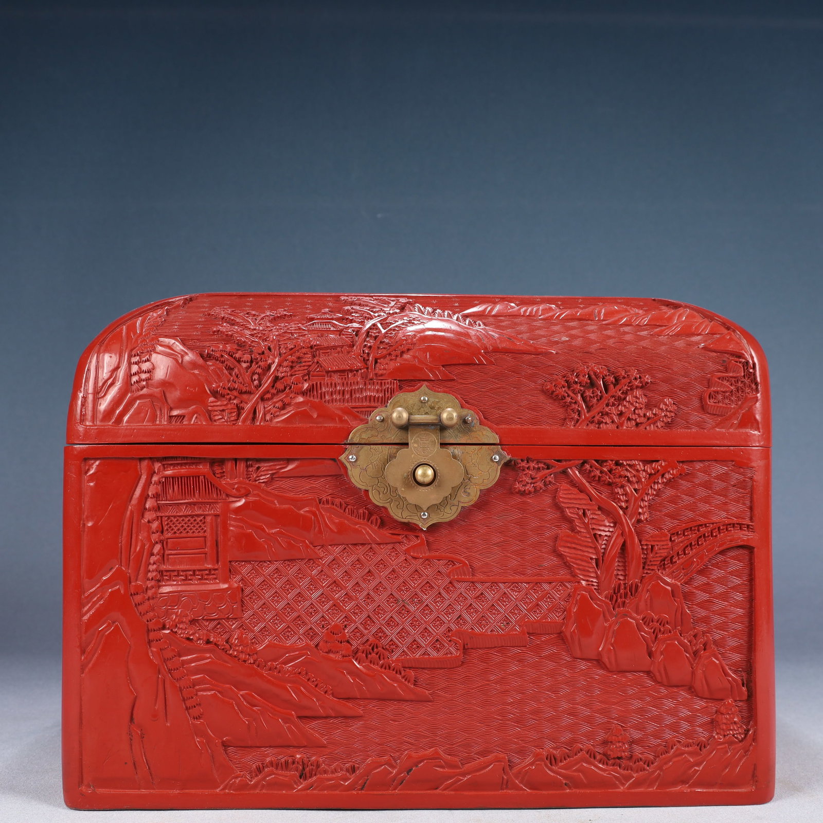 A Rare Carved Red Lacquer Landscape and Figure Pattern Box: A Rare Carved Red Lacquer Landscape and Figure Pattern Box,Qing Dynasty, China,With Mark,Size:12.6inx9.4inx9.8in,Weight:4550g 剔红漆山水人物纹箱&#