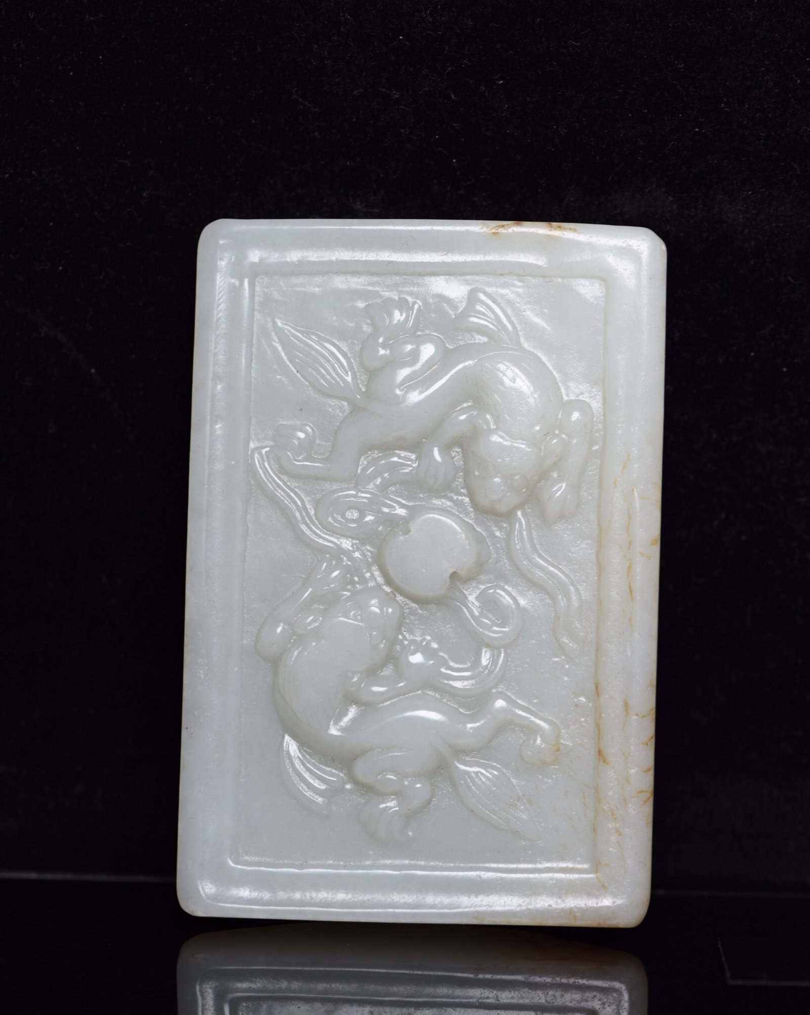 An Exquisite White Jade Auspicious Beast Pattern Pendant: An Exquisite White Jade Auspicious Beast Pattern Pendant,Qing Dynasty,China,Size:3.1inx2.1inx0.4in,Weight:78g 白玉瑞兽纹牌,中国清代