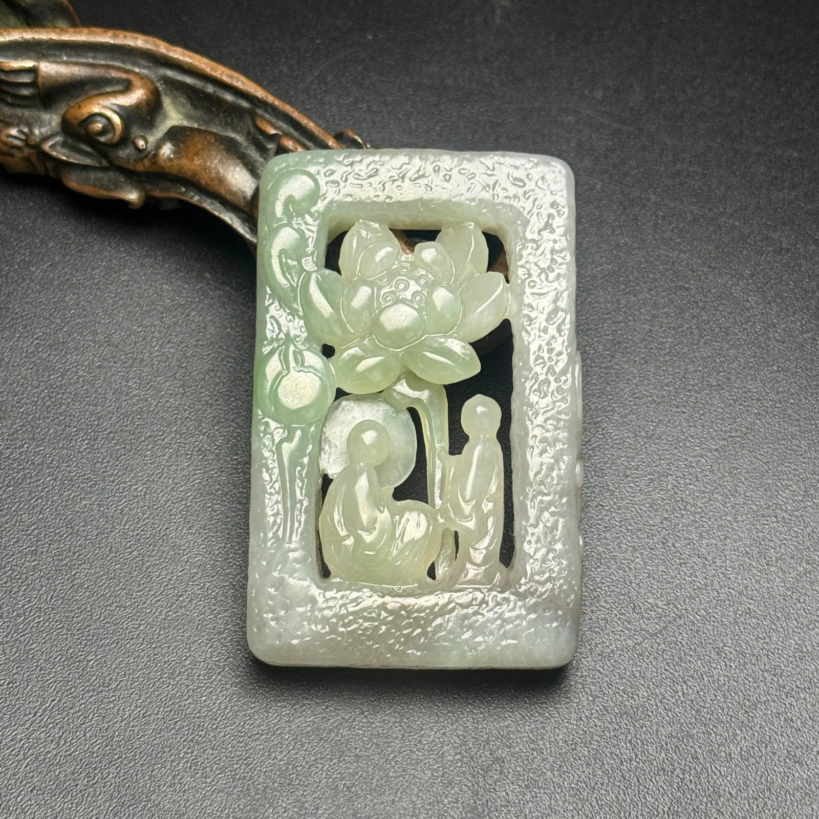 An Exquisite White Jade Figure Pattern Pendant (1 of 7)