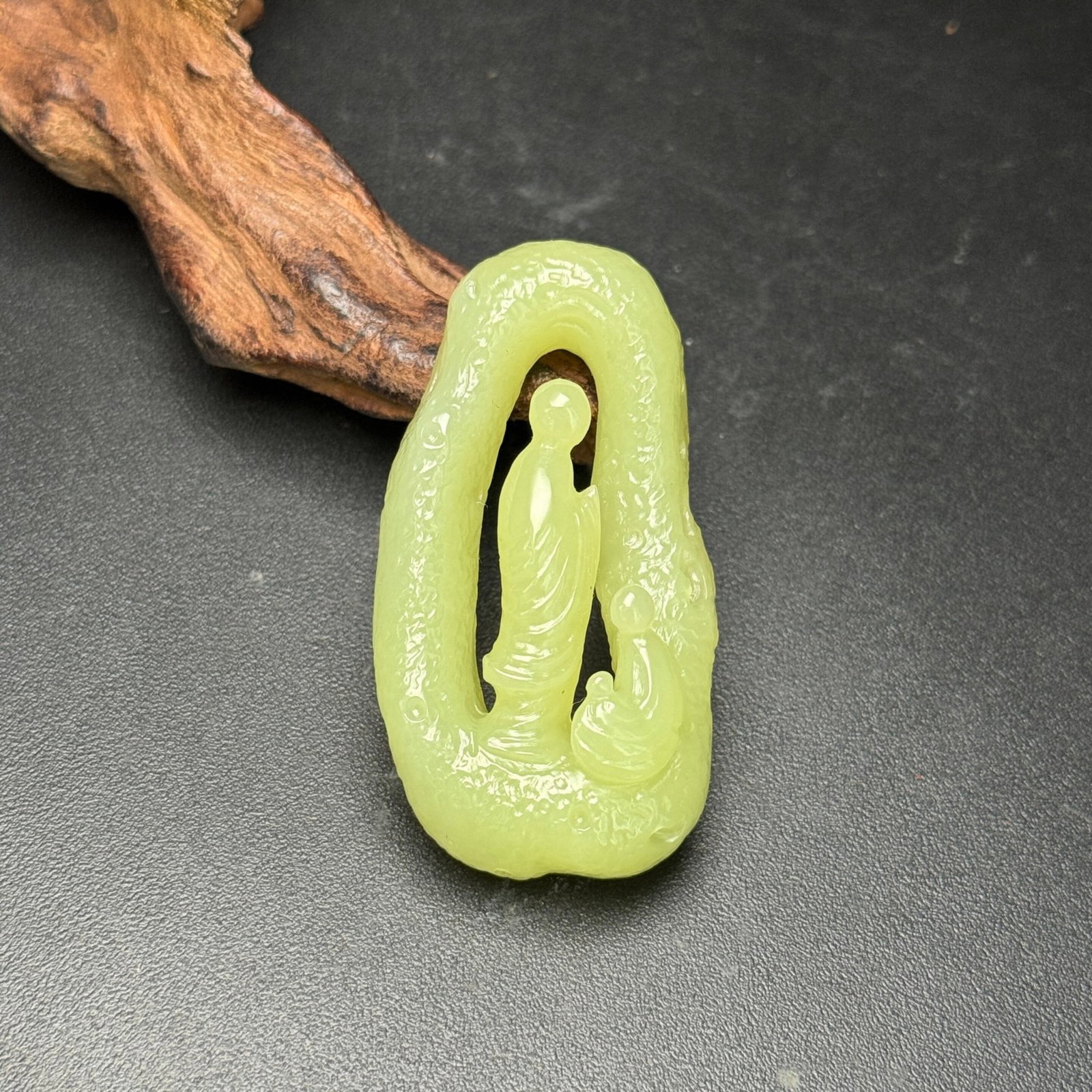 An Exquisite Yellow Jade Figure Pendant: An Exquisite Yellow Jade Figure Pendant,Qing Dynasty,China,Size:2.2inx1.2inx0.6in,Weight:27g 黄玉人物挂件,中国清代