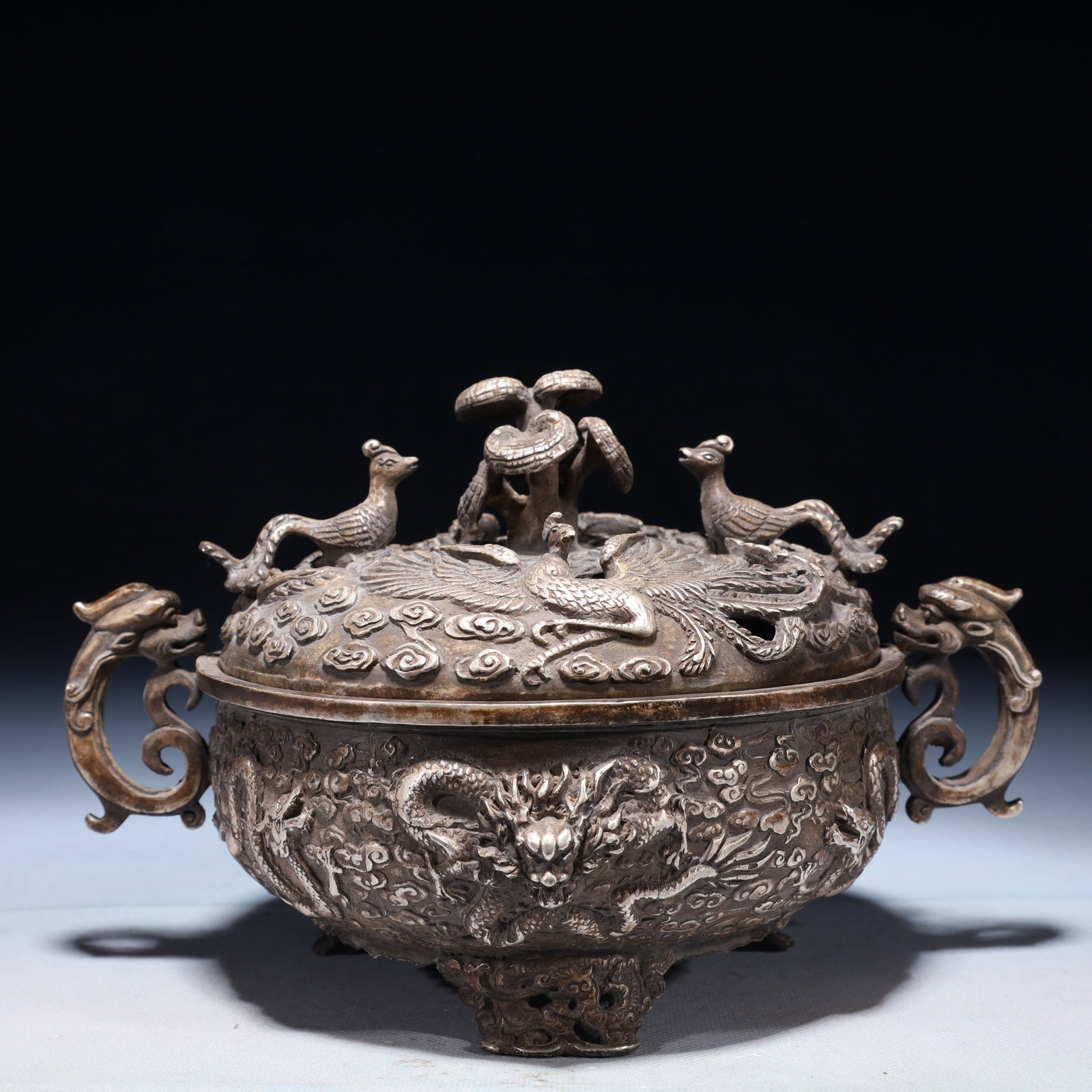 An Exquisite Silver-plated Bronze Auspicious Cloud and Dragon Pattern Double-Ears and Tripod Censer: An Exquisite Silver-plated Bronze Auspicious Cloud and Dragon Pattern Double-Ears and Tripod Censer,Qing Dynasty,China,Size:9.4inx6.7inx5.9in,Weight:1600g