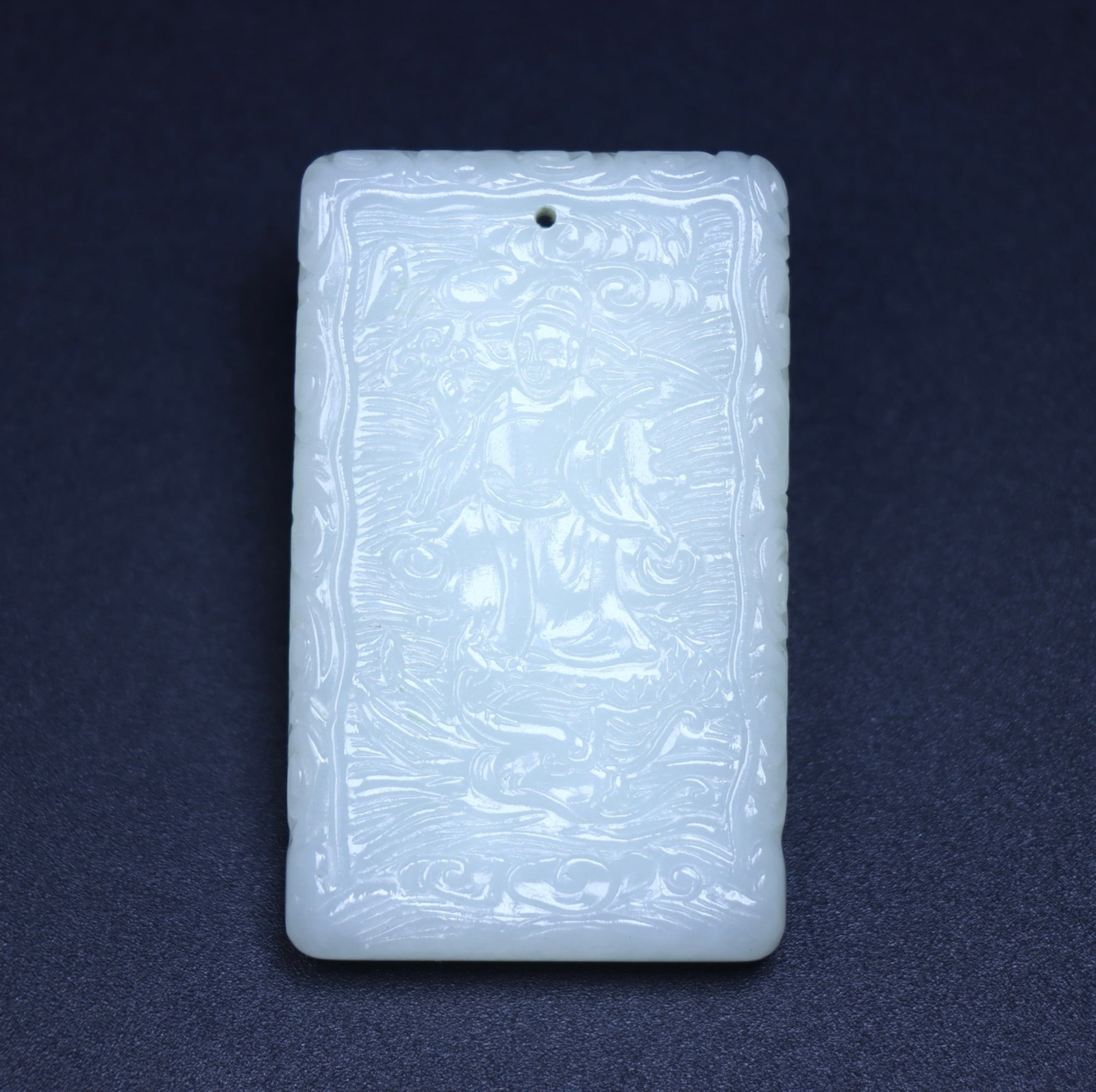 An Exquisite White Jade Statue of Mammon Pendant: An Exquisite White Jade Statue of Mammon Pendant,Qing Dynasty,China,Size:2.4inx1.4inx0.4in,Weight:58g 白玉财神像挂件,中国清代