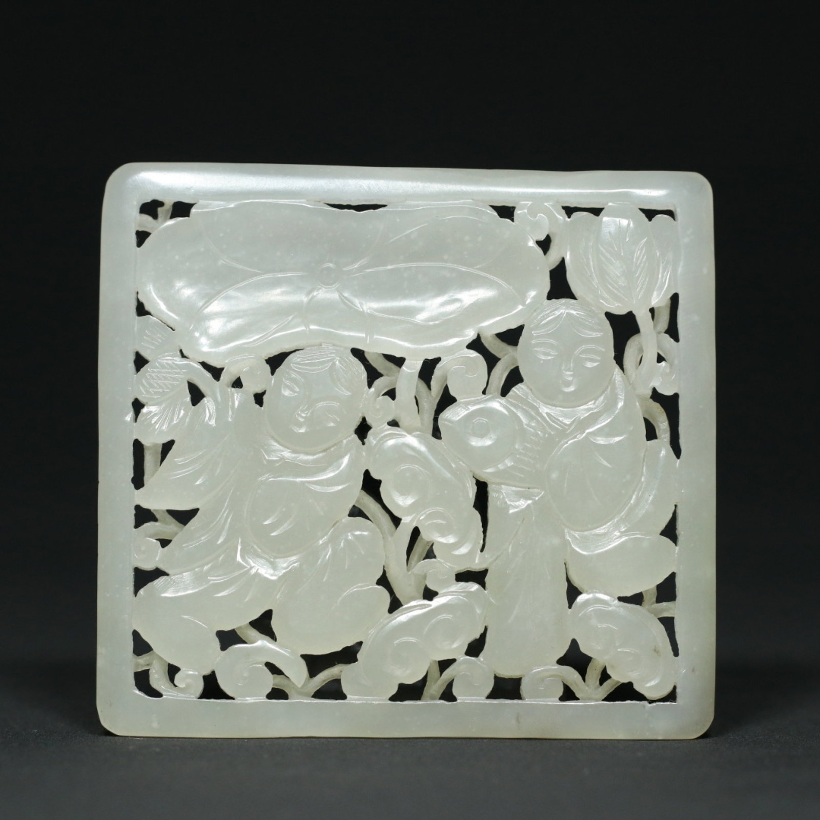 An Exquisite White Jade Hollow Figure Pattern Pendant: An Exquisite White Jade Hollow Figure Pattern Pendant,Qing Dynasty,China,Size:2.8inx3inx0.3in,Weight:73.7g 白玉镂空人物纹挂件,中国