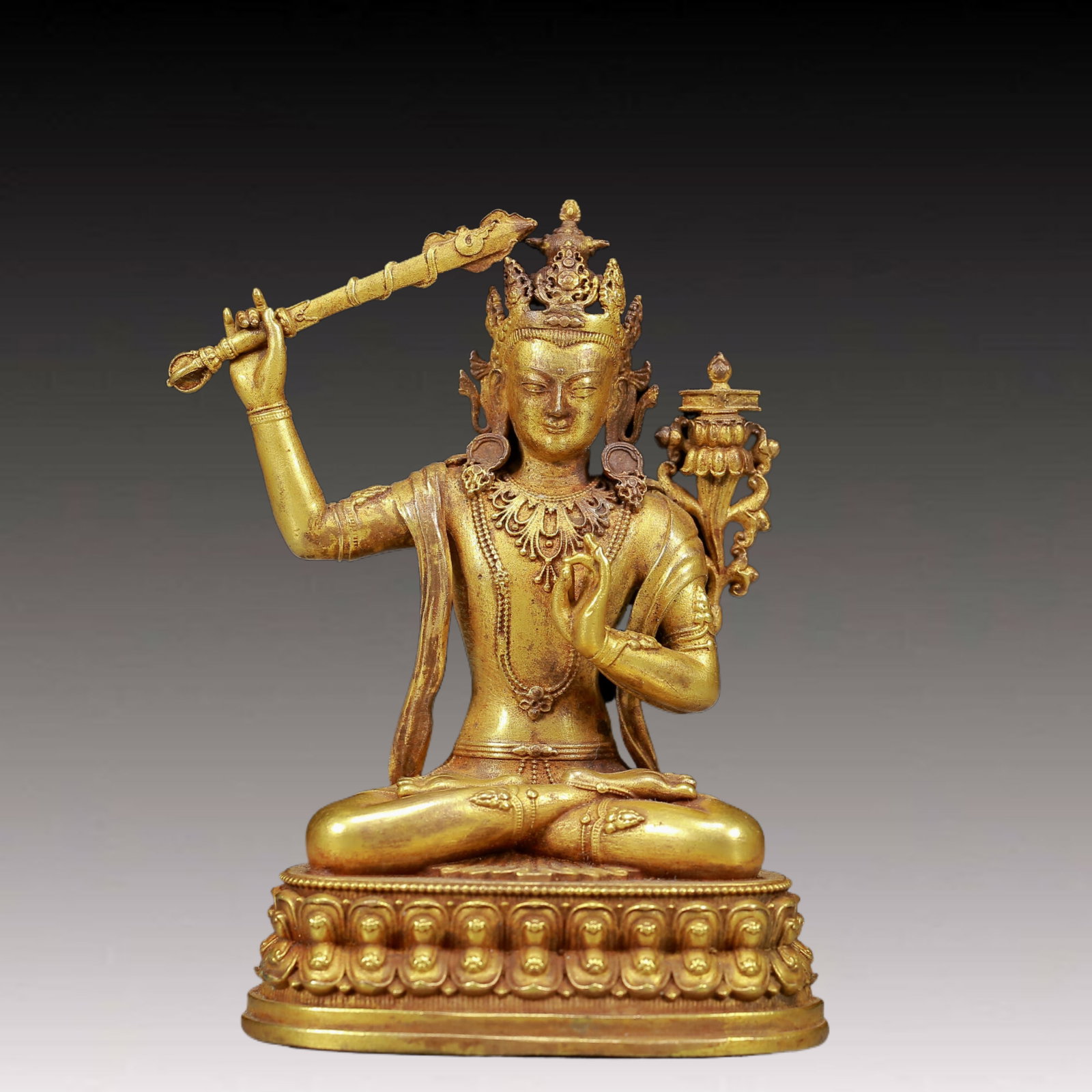 A Solemn Gilt Bronze Statue of Manjusri: A Solemn Gilt Bronze Statue of Manjusri,Ming Dynasty, China,Size:2.8inx2.4inx4in,Weight:275g 铜鎏金文殊菩萨像，明代