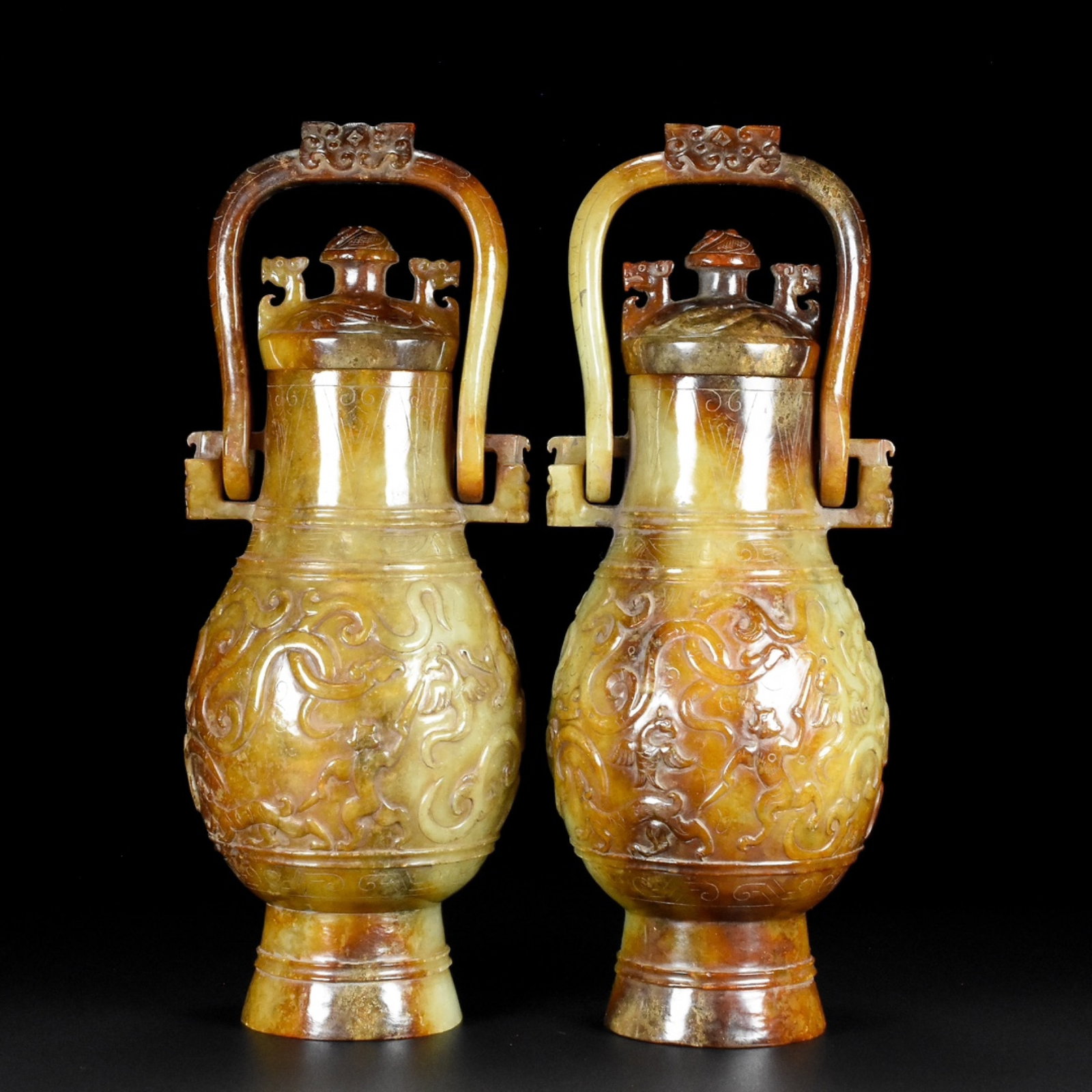 A Pair of Archaic Gaogu yu Beast Pattern Ewer: A Pair of Archaic Gaogu yu Beast Pattern Ewer,Ancient Time, China, Size:3.5inx3.5inx9.7in, Weight:1872g 一对高古玉兽纹提壶,中国远