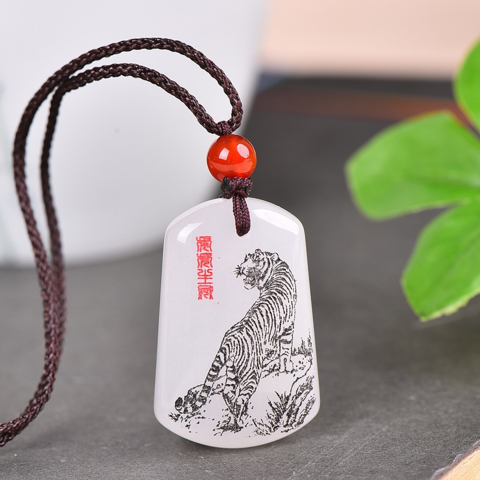 An Exquisite White Jade Tiger Pattern Pendant: An Exquisite White Jade Tiger Pattern Pendant,Size:0.8inx1.3in 白玉虎纹挂件