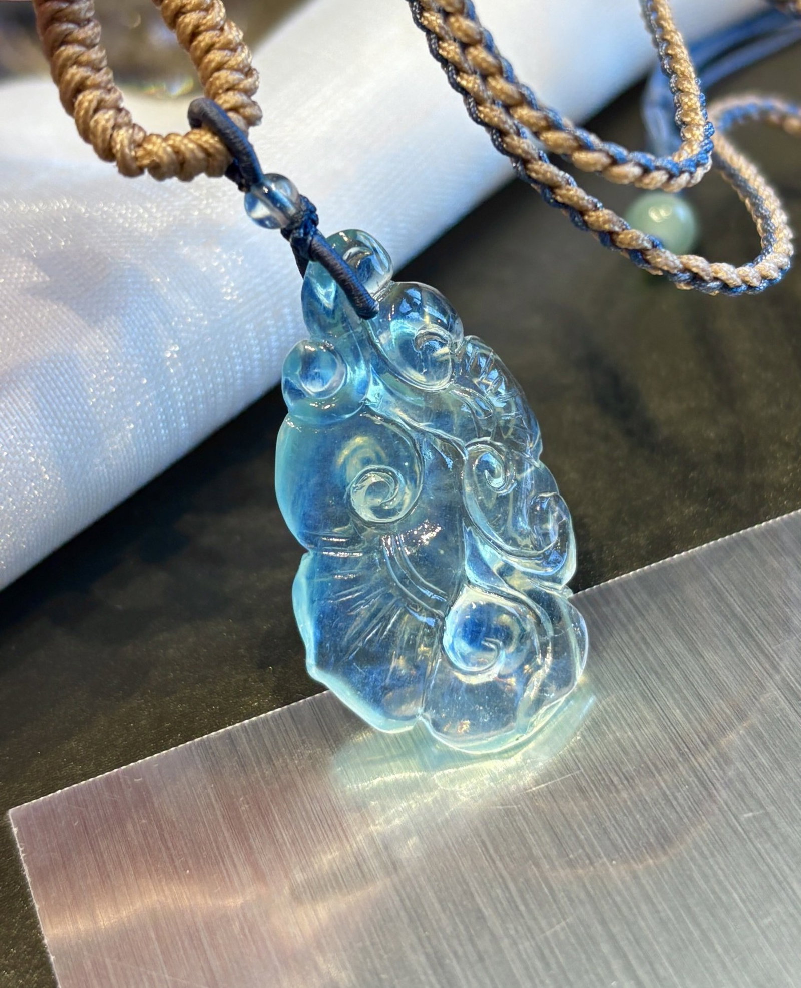 An Exquisite Aquamarine Ruyi Necklace: An Exquisite Aquamarine Ruyi Necklace,Size:1.4inx0.8inx0.3in,Weight:6.7g 海蓝宝如意吊坠
