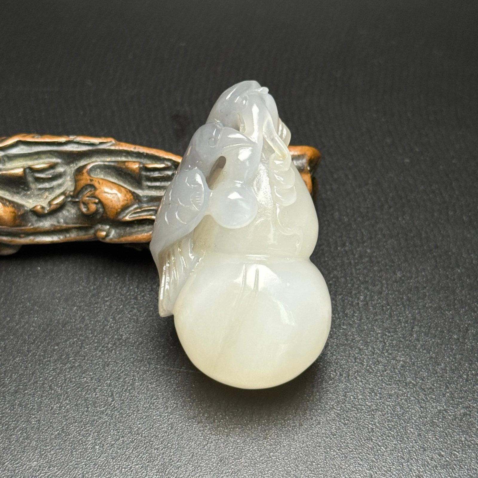 An Exquisite White Jade Gourd Pendant: An Exquisite White Jade Gourd Pendant,Qing Dynasty,China,Size:2.3inx1.3inx0.9in,Weight:71g 白玉葫芦挂件,中国清代