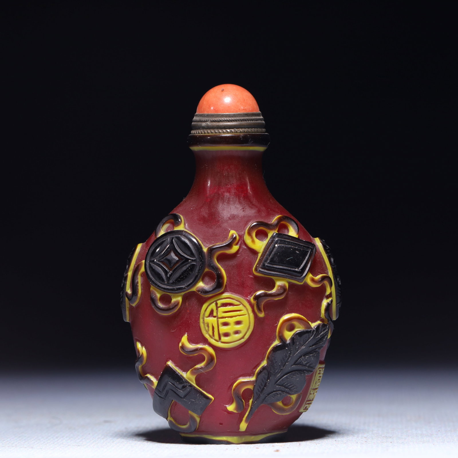 An Exquisite Glass Eight Treasures Pattern Snuff Bottle: An Exquisite Glass Eight Treasures Pattern Snuff Bottle,Qing Dynasty,China,Qianlong Four-character Mark,Size:1.8inx1inx3.1in,Weight:75g