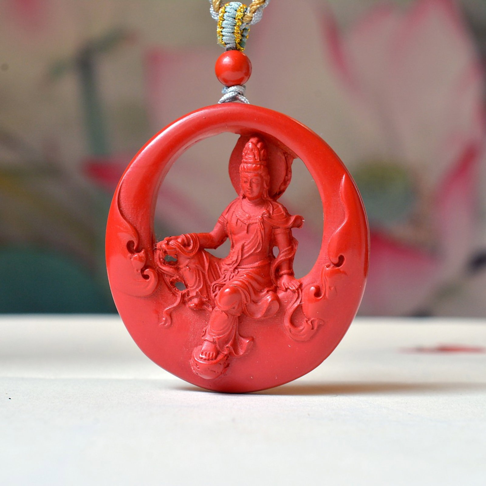 An Exquisite Cinnabar Avalokitesvara Pendant: An Exquisite Cinnabar Avalokitesvara Pendant,Size:1.7inx1.8in (寓意)吉祥招财喜庆、驱邪避凶