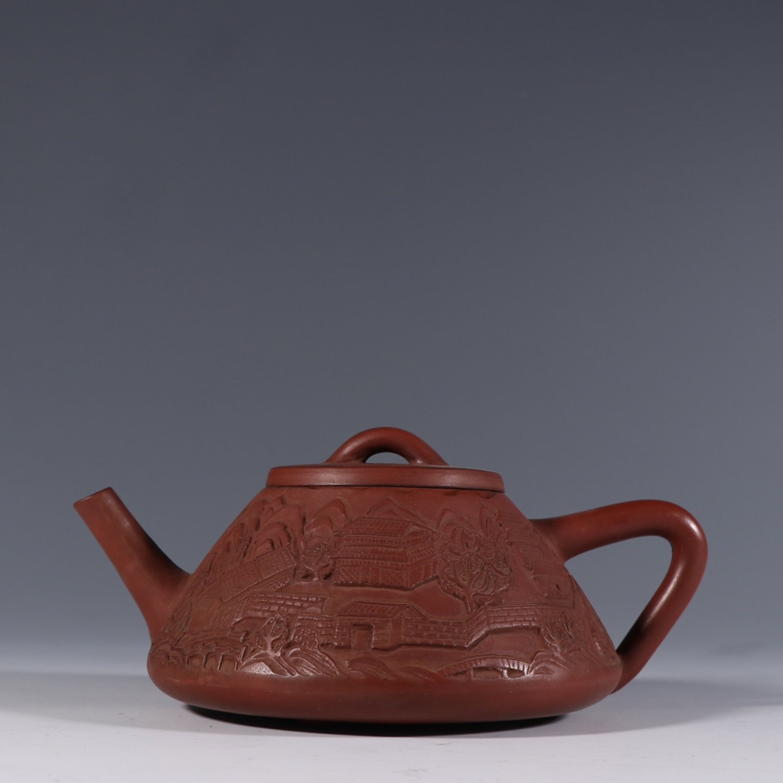 A Rare Purple Sands Landscape Pattern Teapot: A Rare Purple Sands Landscape Pattern Teapot,Qing Dynasty,China,With Mark,Size:3.5inx7in 紫砂山水纹茶壶,中国清代,带款