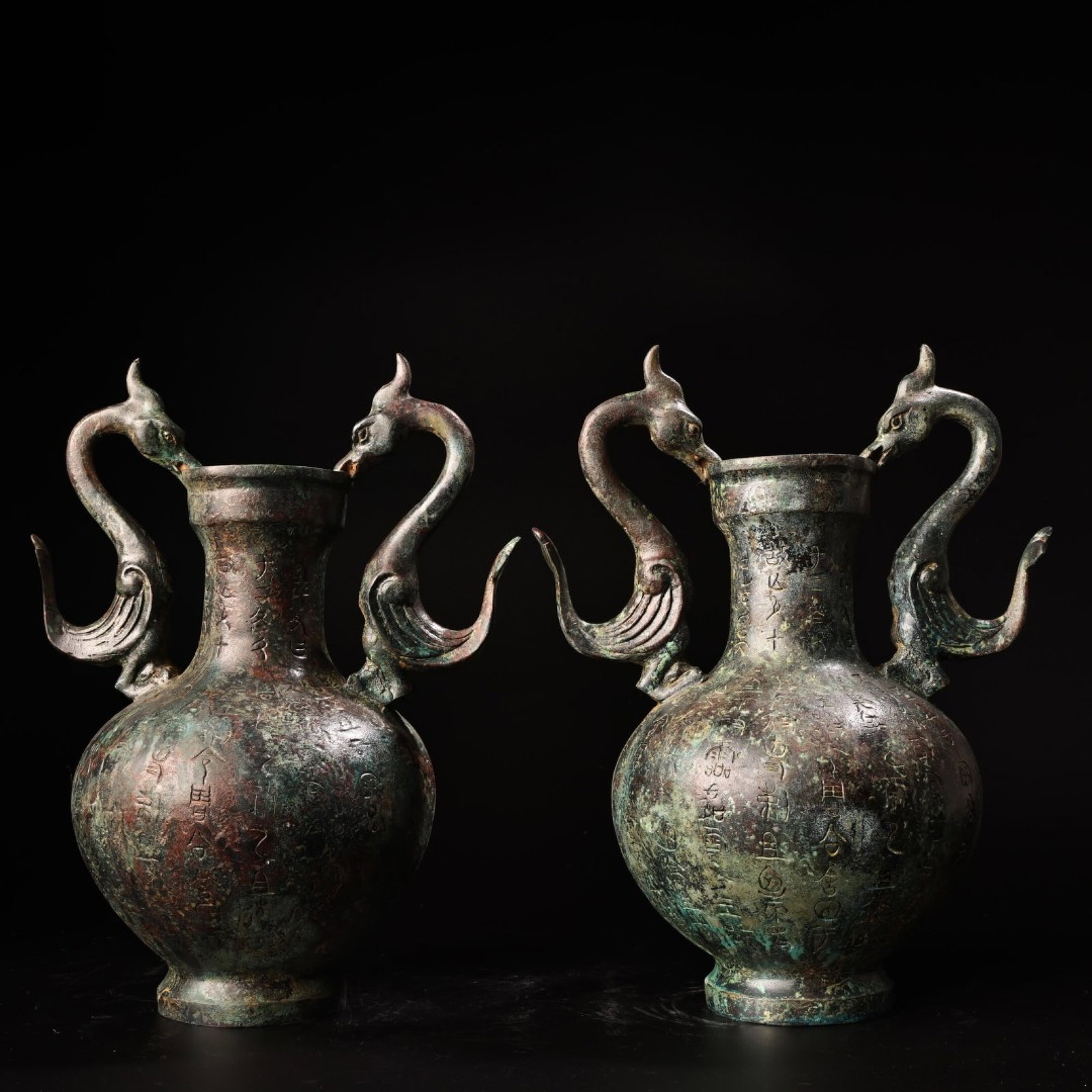 A Pair of Archaic Bronze Bird Pattern Pots,With Inscription: A Pair of Archaic Bronze Bird Pattern Pots,With Inscription,Ancient Time,China,Size:10.6inx8.3in,Weight:1700g 一对青铜鸟纹壶,带铭文,中