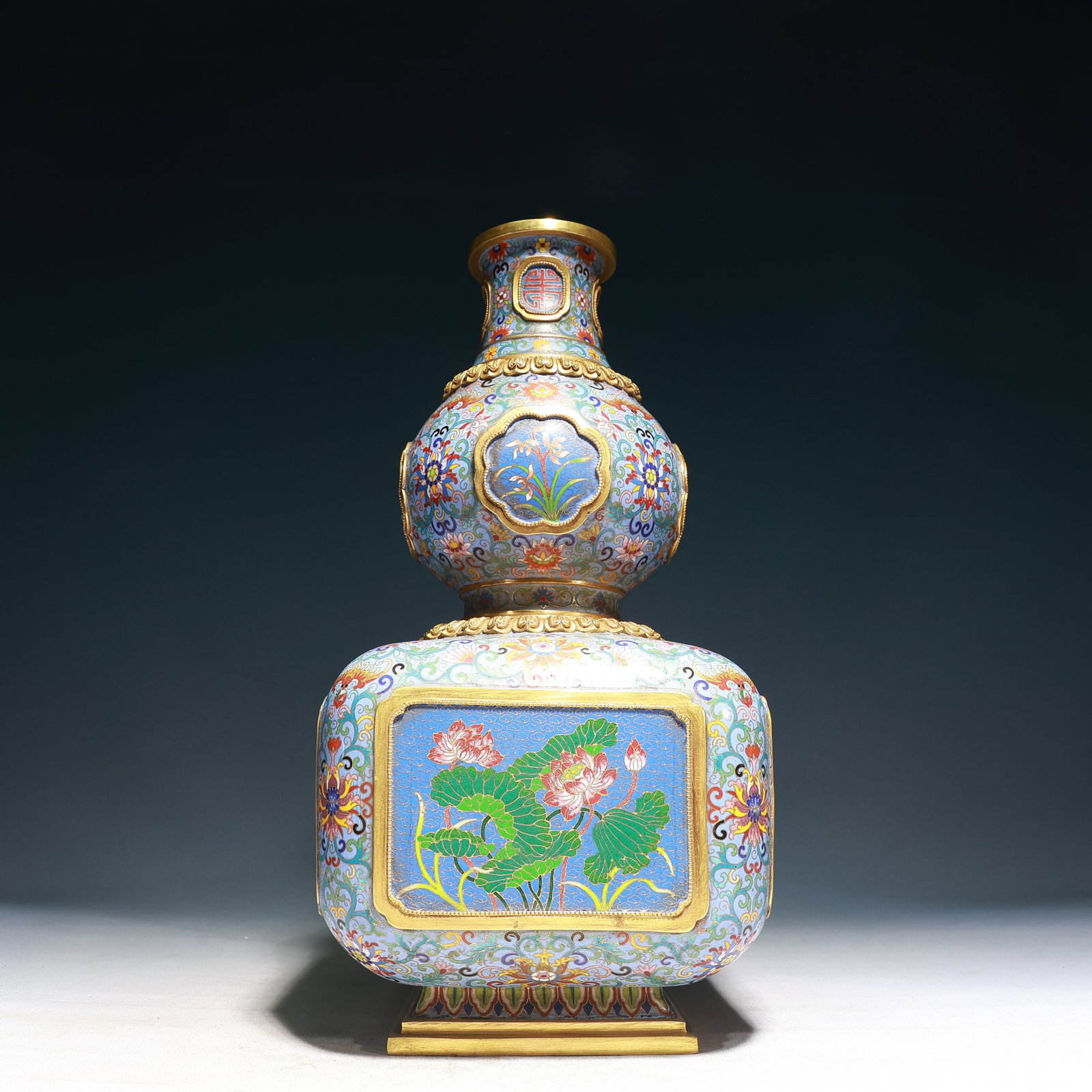 A Huge Cloisonne Flower Pattern Gourd-Shaped Vase: A Huge Cloisonne Flower Pattern Gourd-Shaped Vase,Qing Dynasty, China,Qianlong Four-character Mark,Size:9.4inx18.9in,Weight:11950g