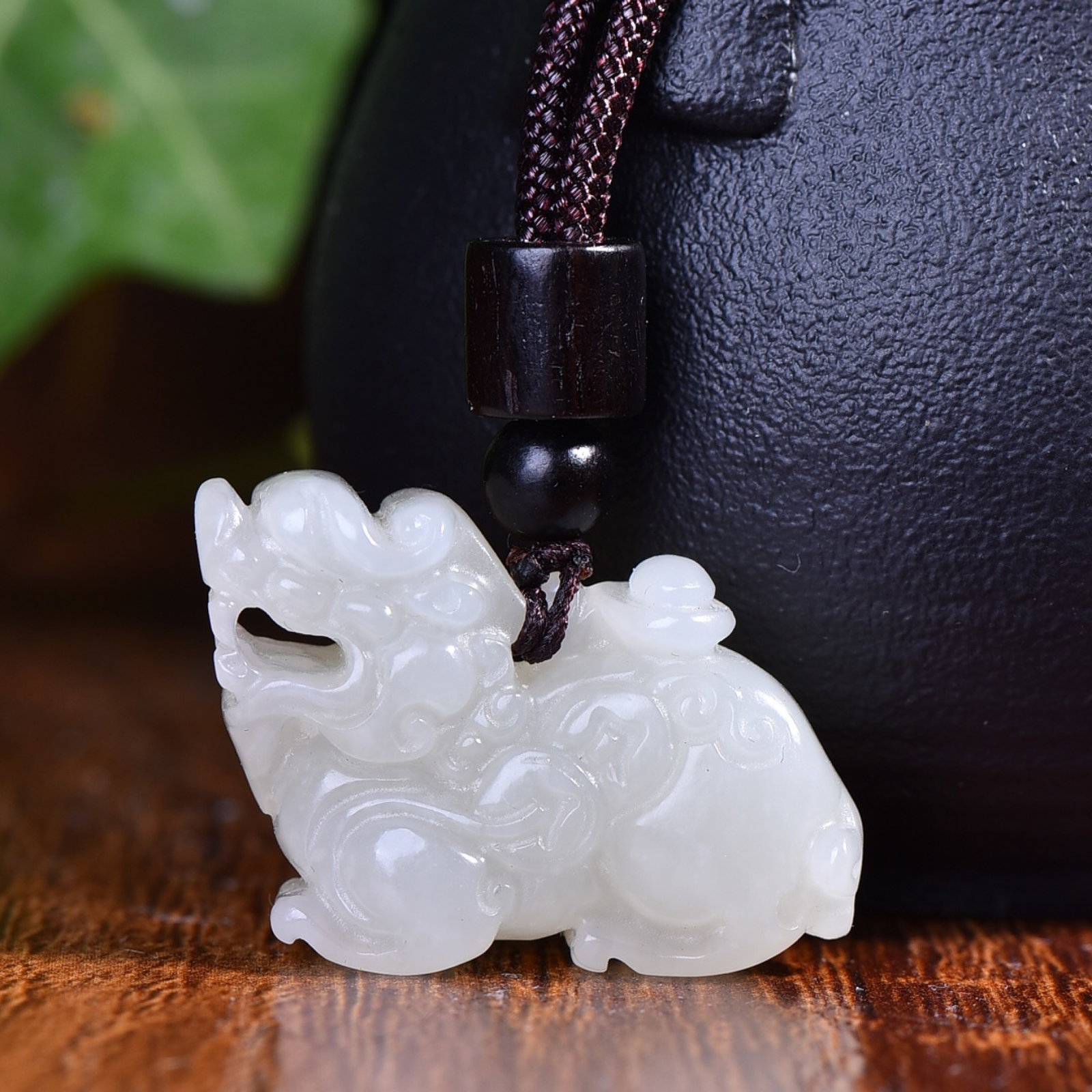 An Exquisite White Jade Wealth-Attracting Creature Pendant: An Exquisite White Jade Wealth-Attracting Creature Pendant,Size:1.1inx0.9in 白玉貔貅挂件