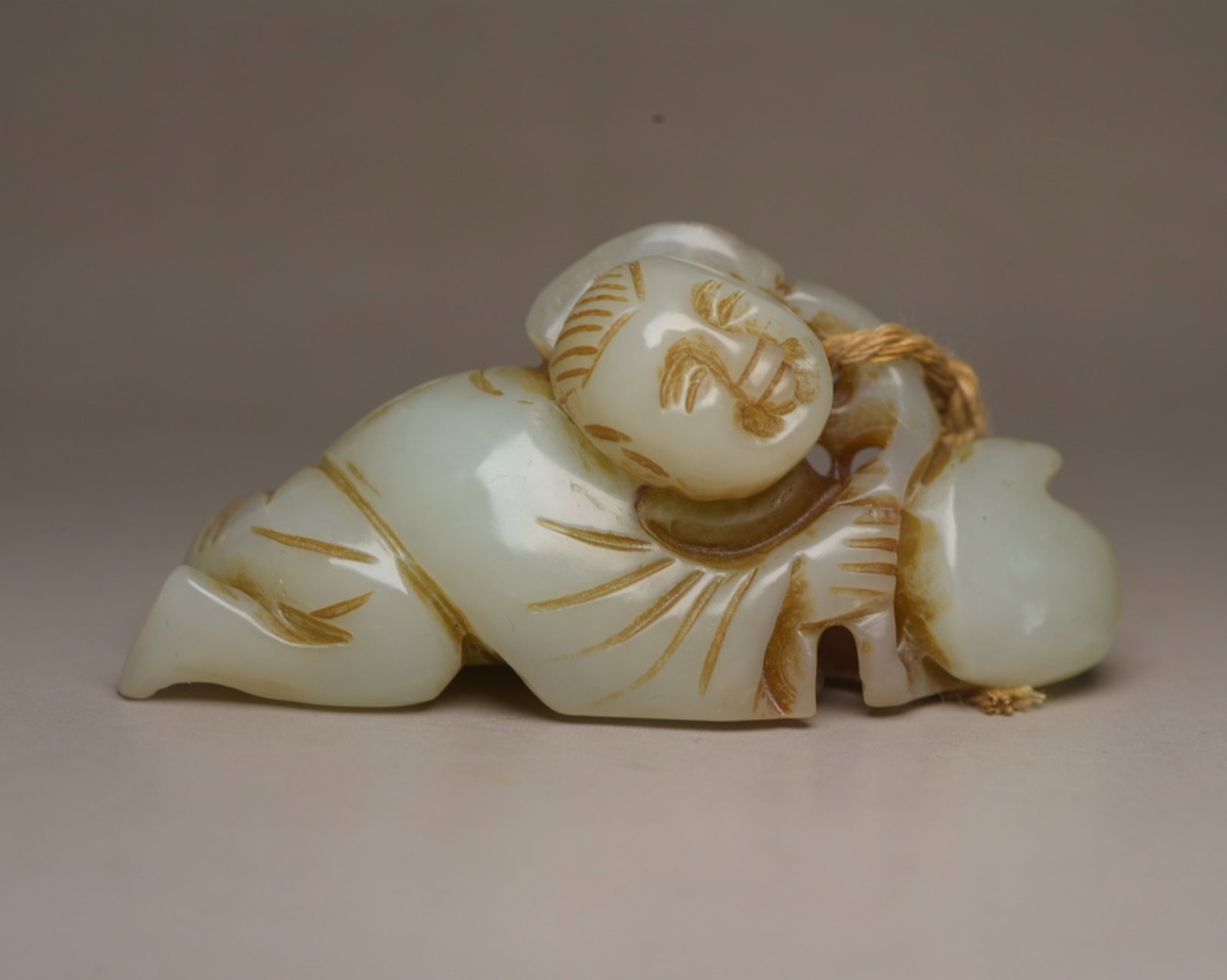 An Exquisite White Jade Figure Ornament: An Exquisite White Jade Figure Ornament,Qing Dynasty,China,Size:2.7inx1.1inx0.9in,Weight:50g 白玉人物摆件,中国清代